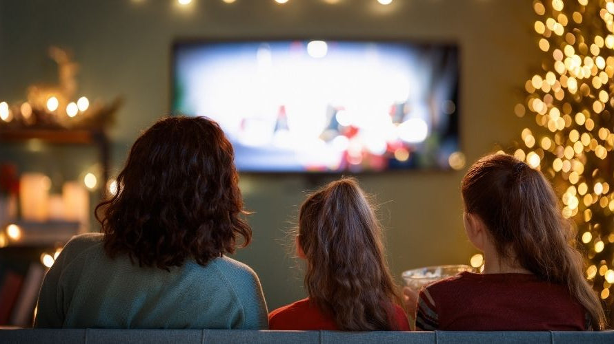 the family are watching movies