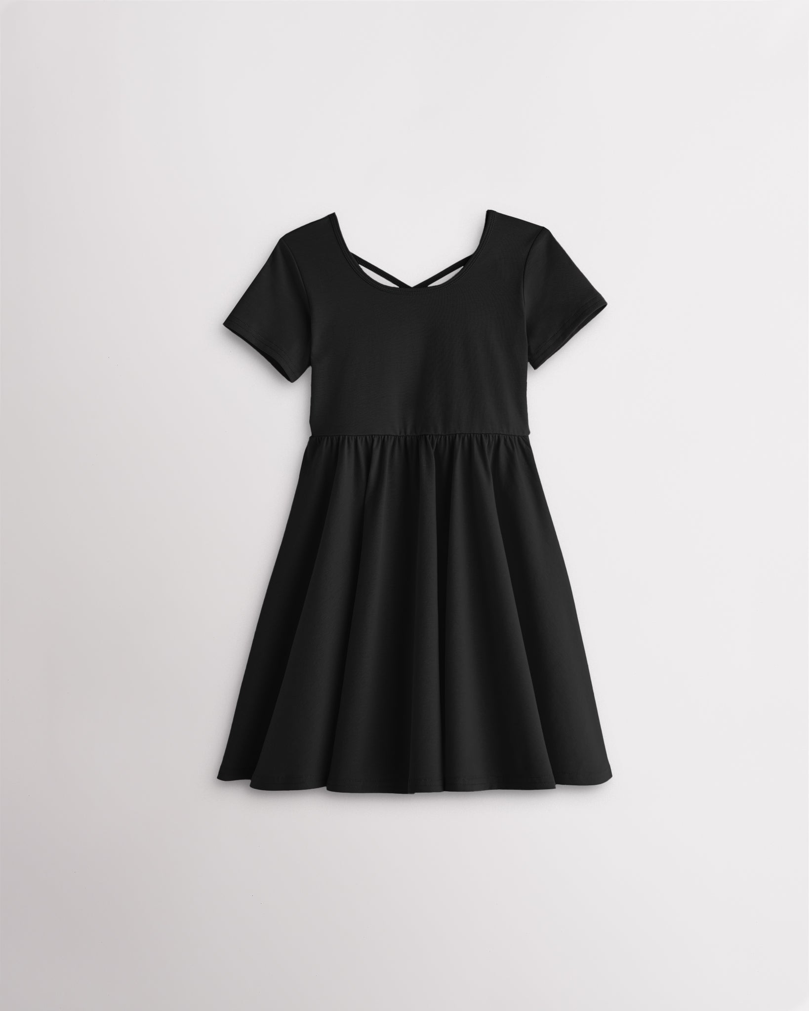 Girls black short sleeve A-line twirly dress with a flared skirt.