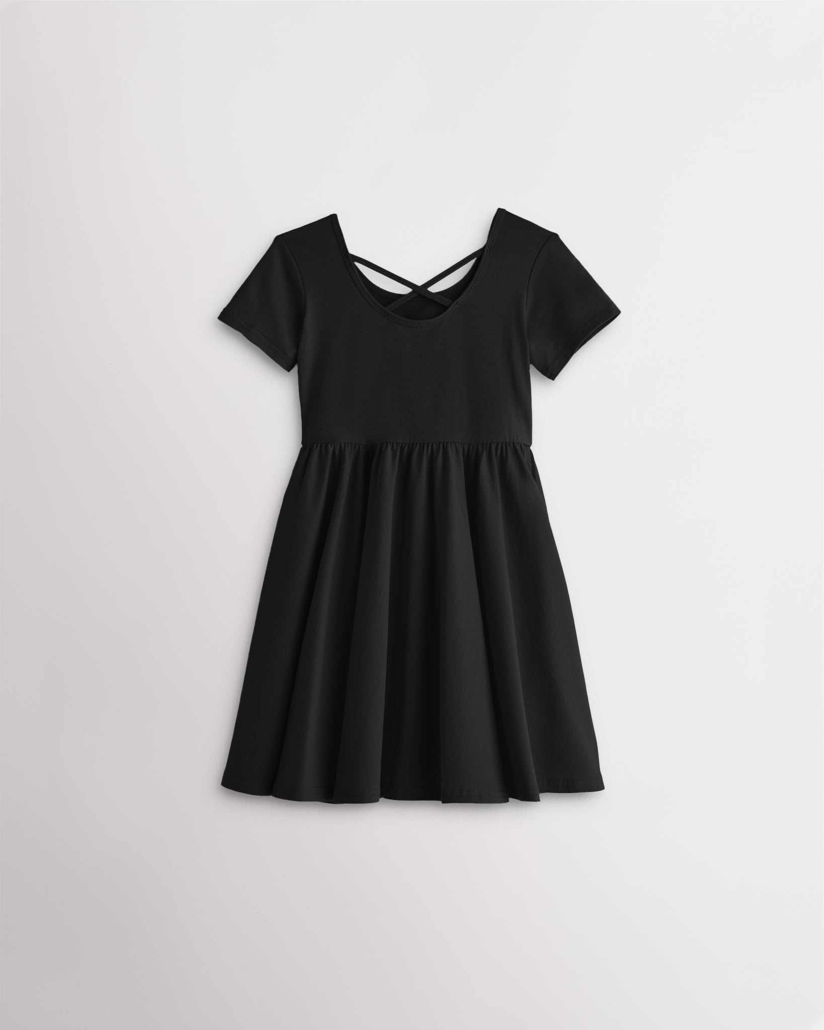 Girls black short sleeve A-line twirly dress with a flared skirt.
