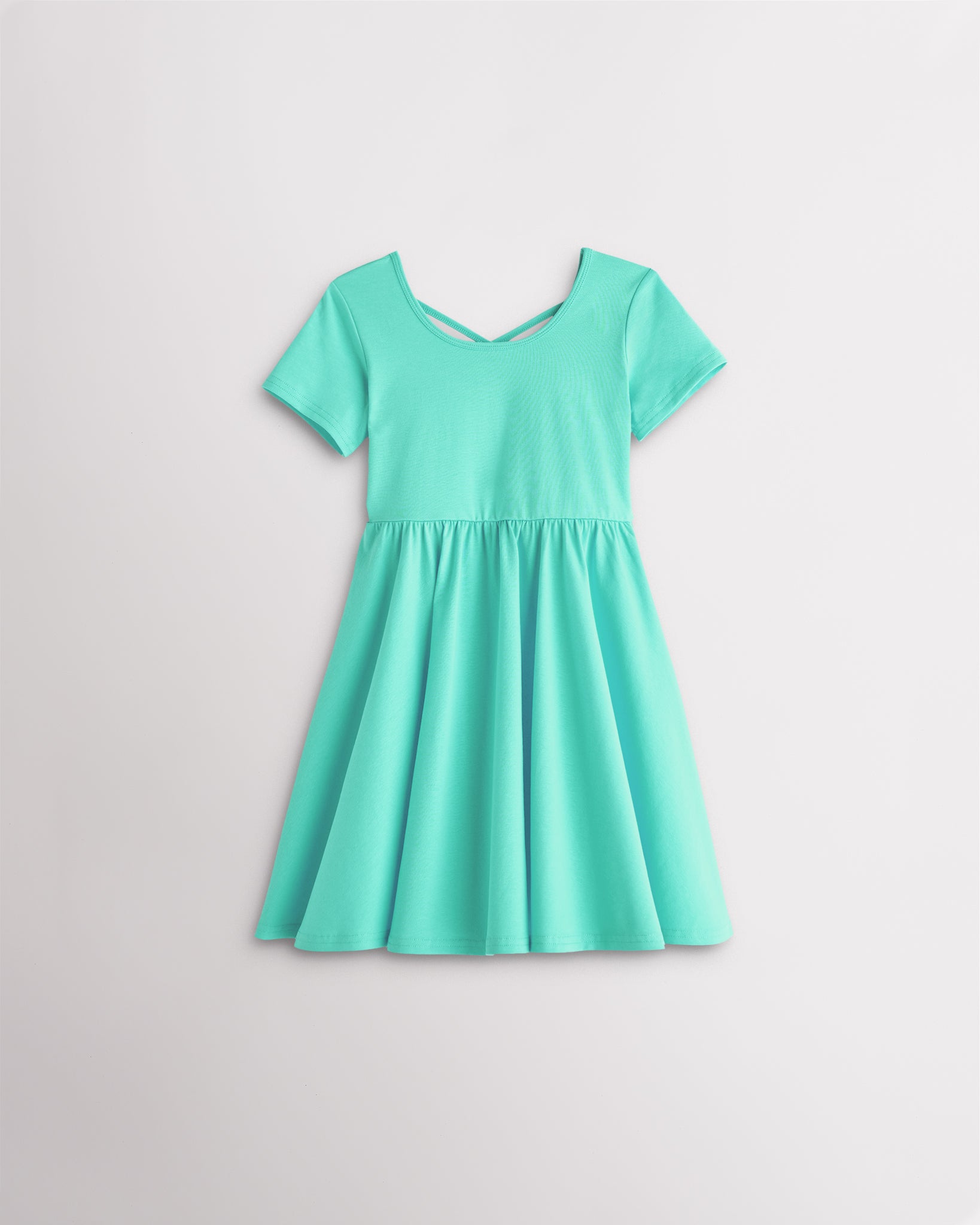 Girls mint green short sleeve A-line twirly dress with a flared skirt.