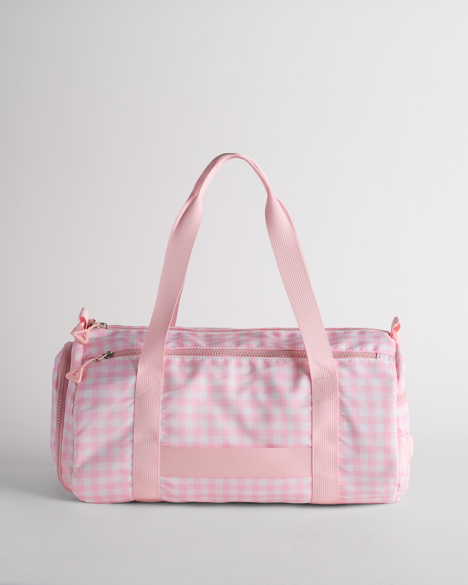 Pink gingham duffle bag with multiple pockets and sturdy straps for organized storage.