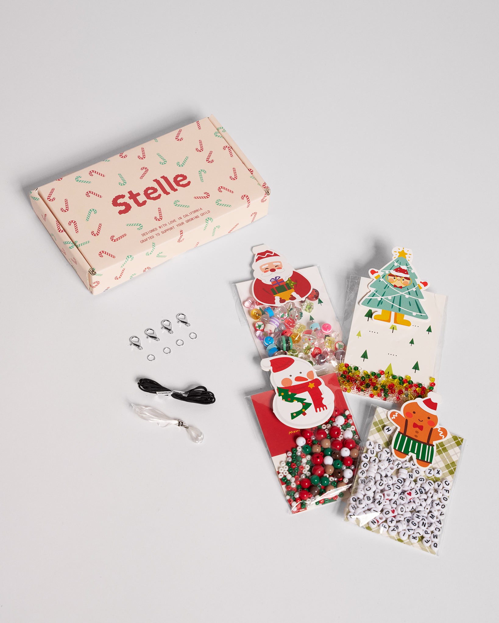 Stelle craft kit with decorative items on a gray background