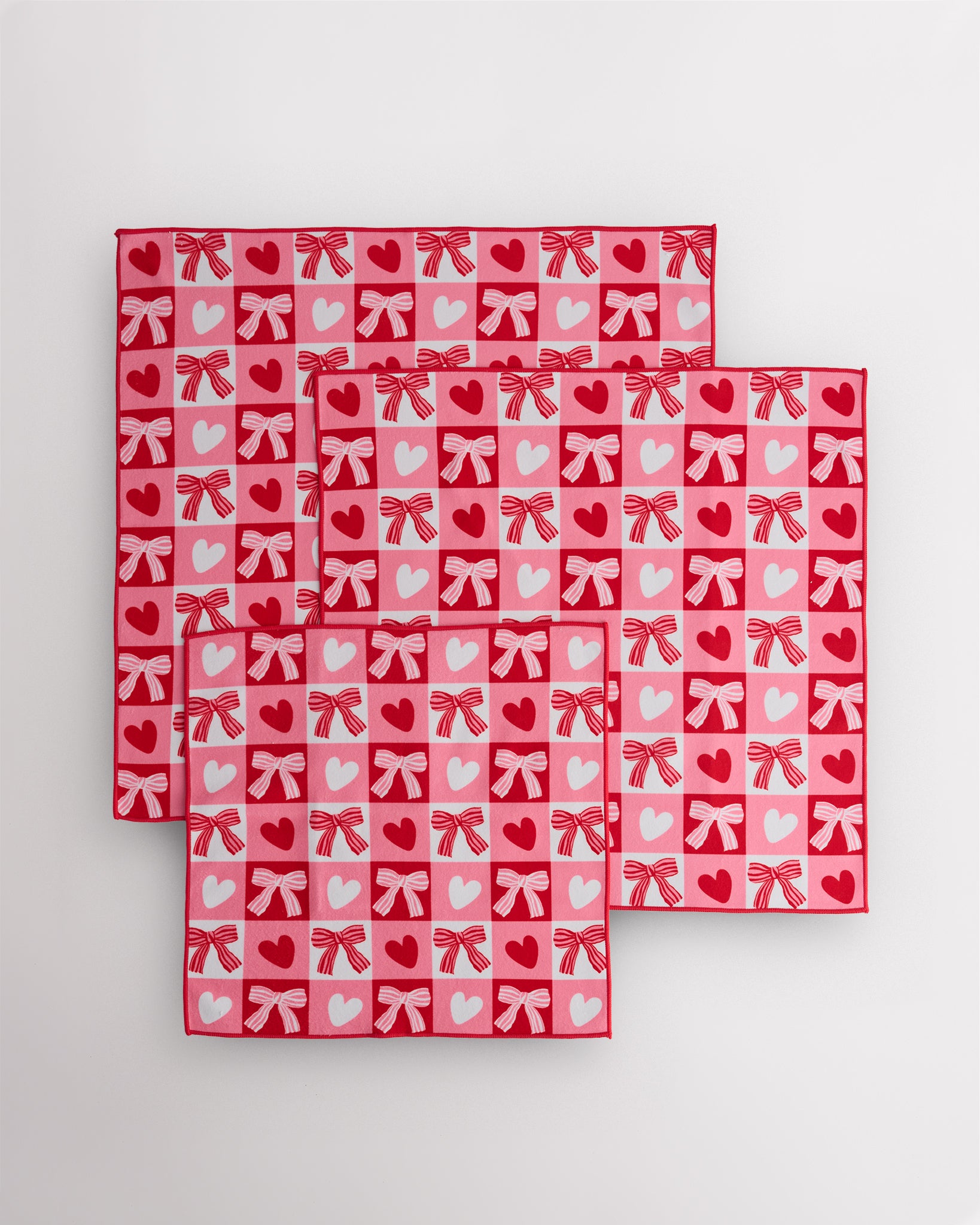 Three sizes of Magic Self-Adhesive Wrapper Essential Bag with red and pink heart and bow print