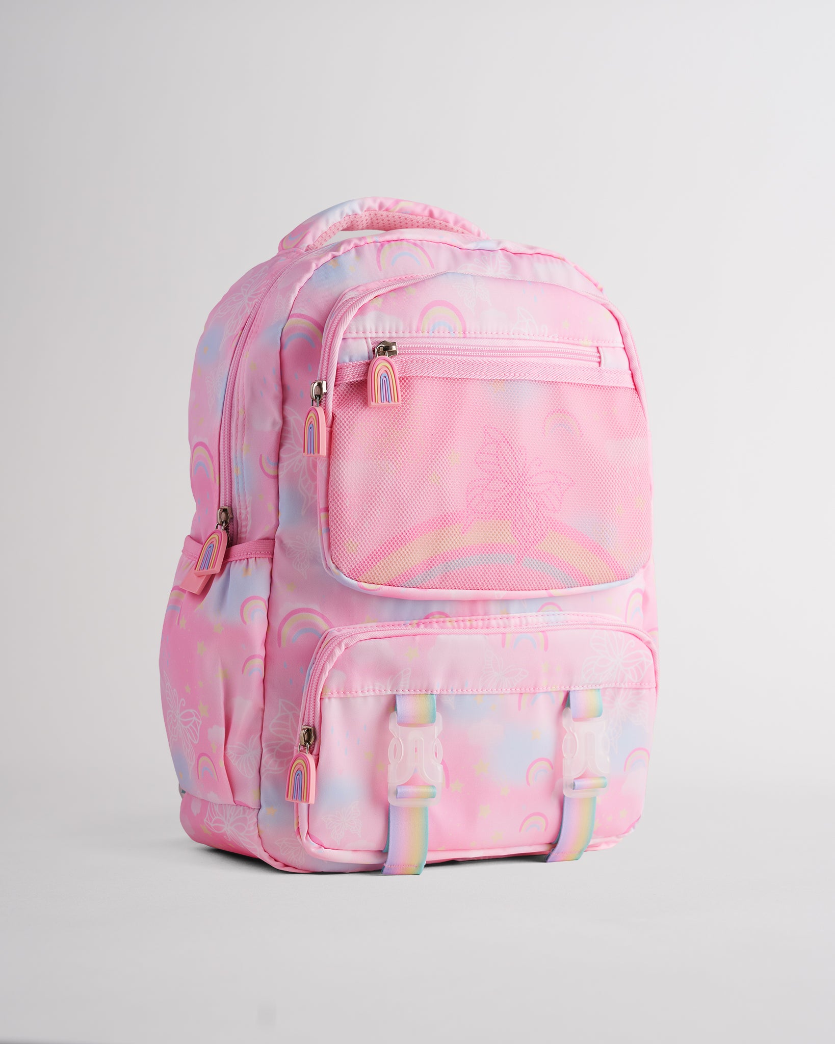 Pink Stelle kids backpack with rainbow print, front mesh pocket, zipper compartments, and rainbow zipper pulls.