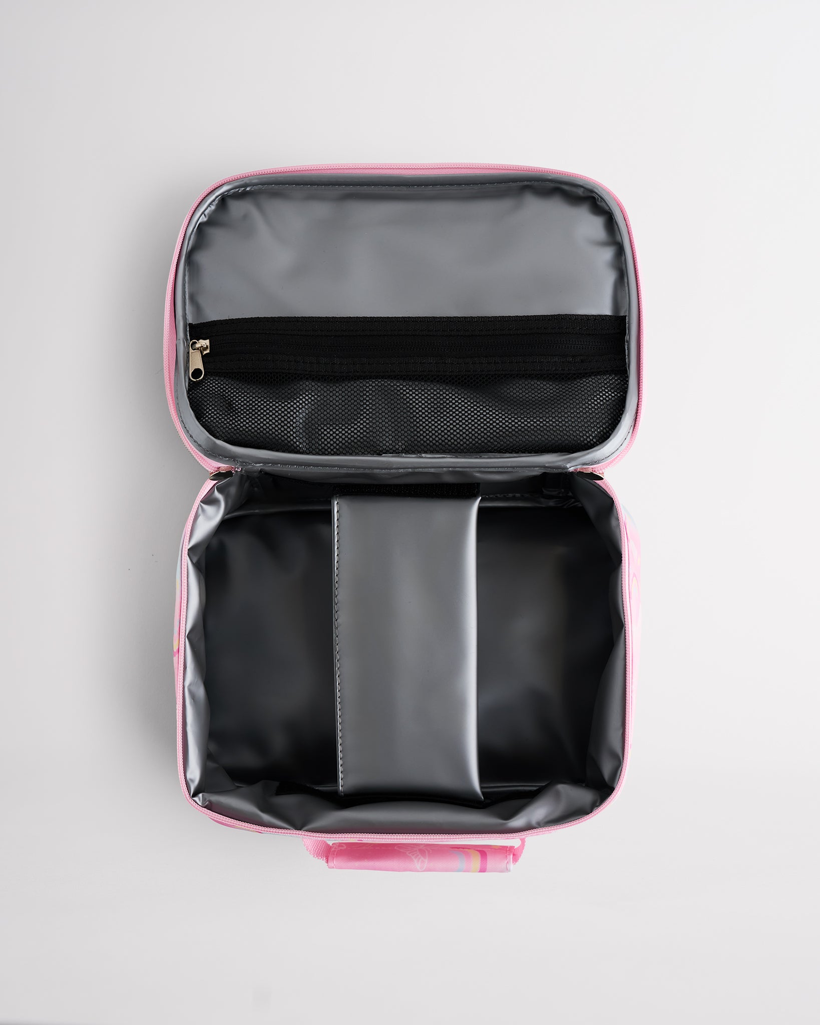 Open Stelle kids lunch bag showing insulated interior, zipper mesh pocket, and roomy storage for school meals.