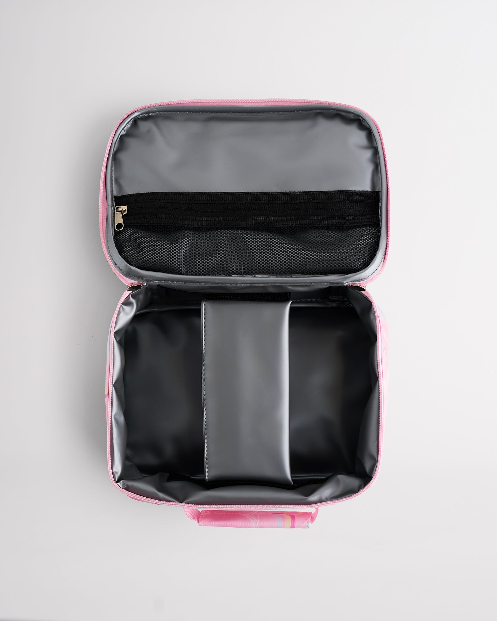 Open Stelle kids lunch bag showing insulated interior, zipper mesh pocket, and roomy storage for school meals.