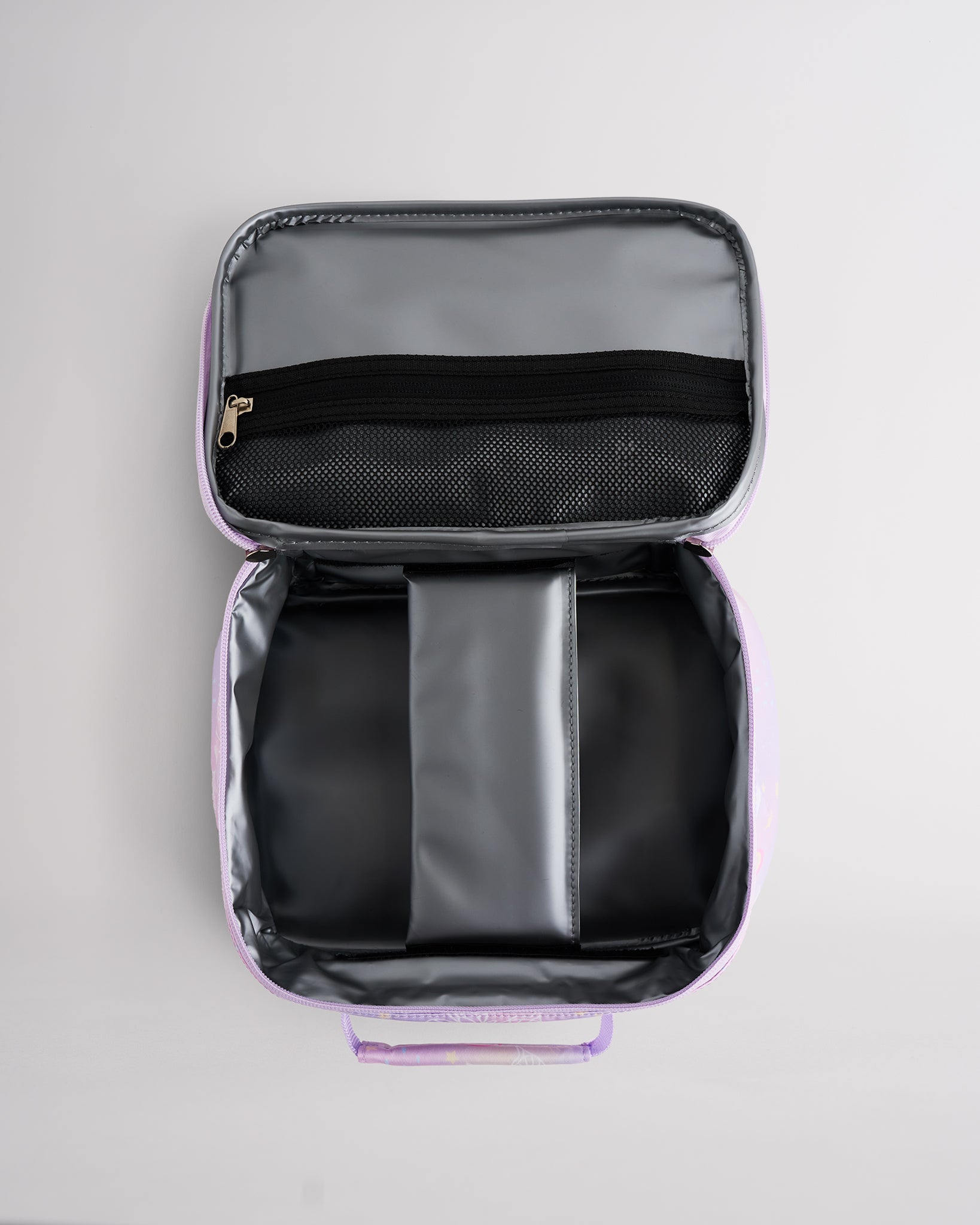 Open Stelle kids lunch bag showing insulated interior, zipper mesh pocket, and roomy storage for school meals.
