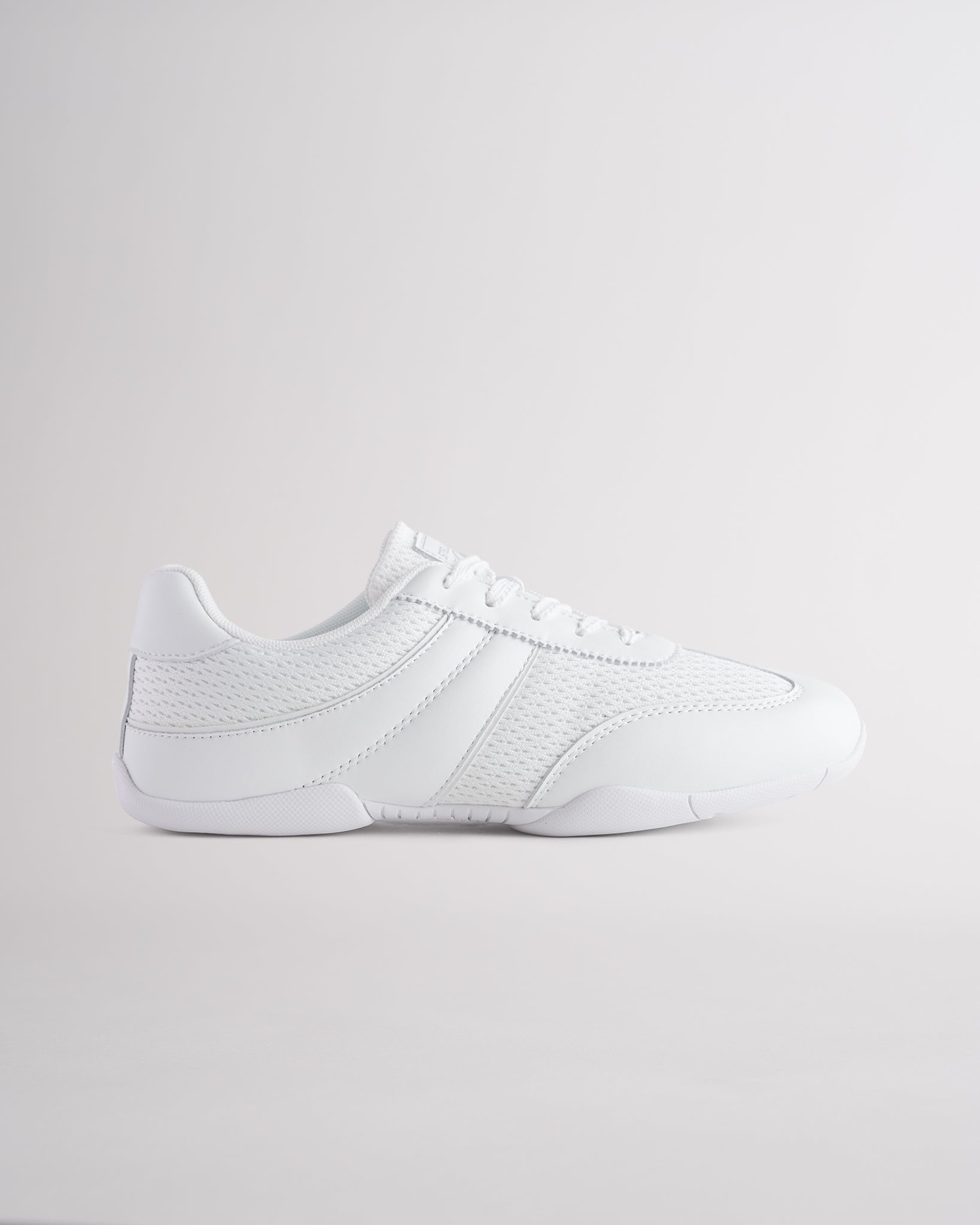 White Studio air mesh cheer shoes with lace-up closure.