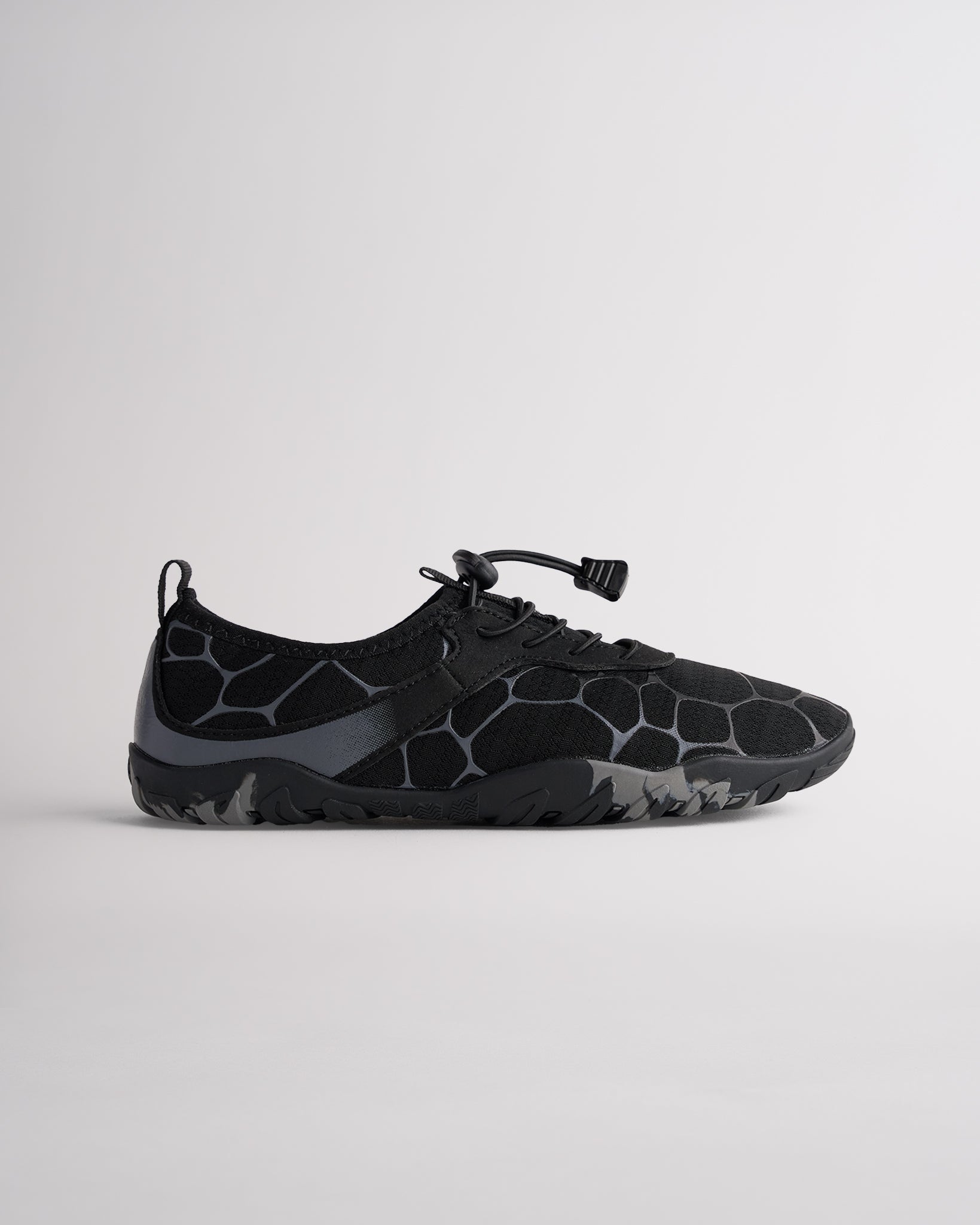 Black women’s water shoes with mesh upper and speed lace system, side profile view
