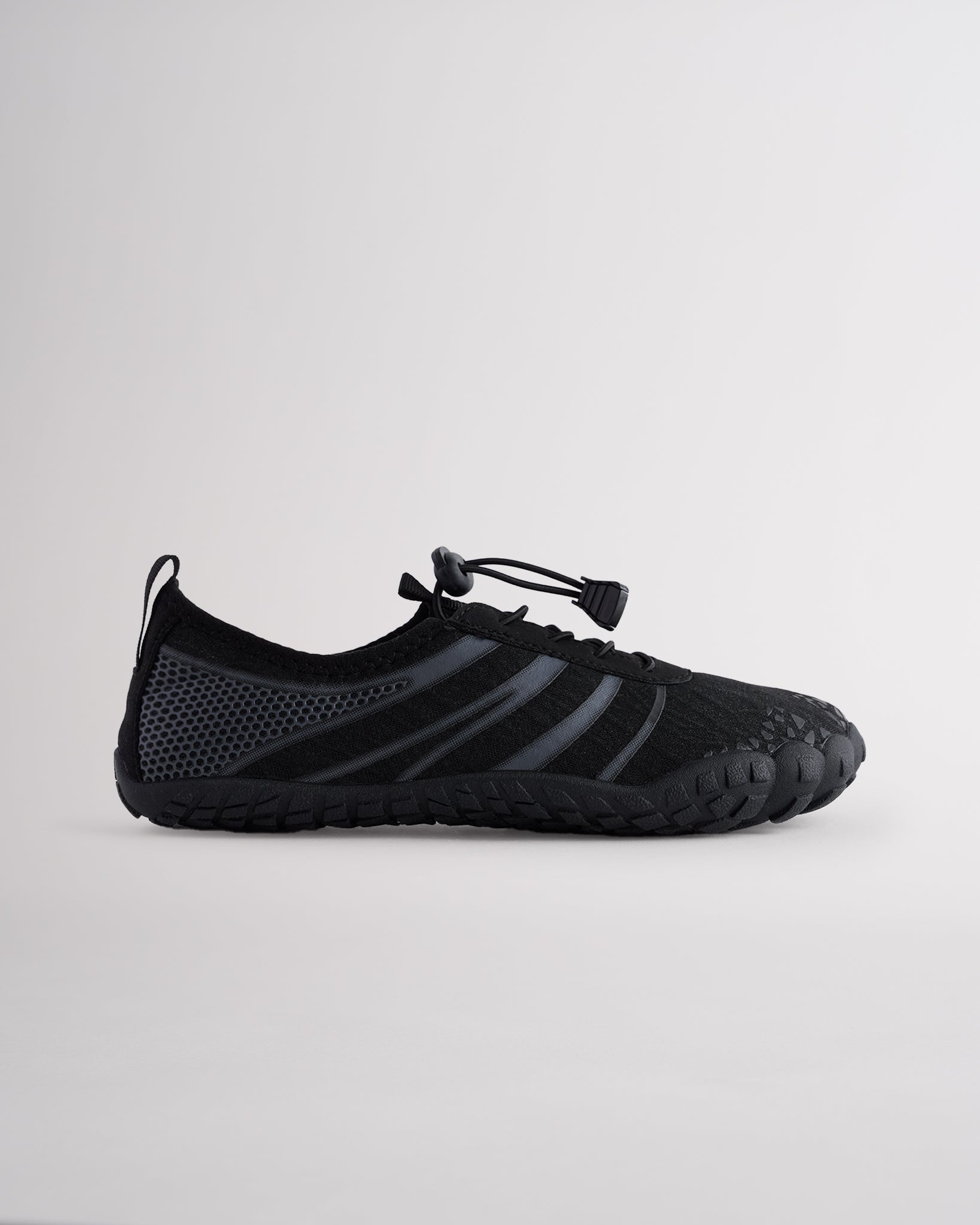 Black women’s water shoes with mesh upper and speed lace system, side profile