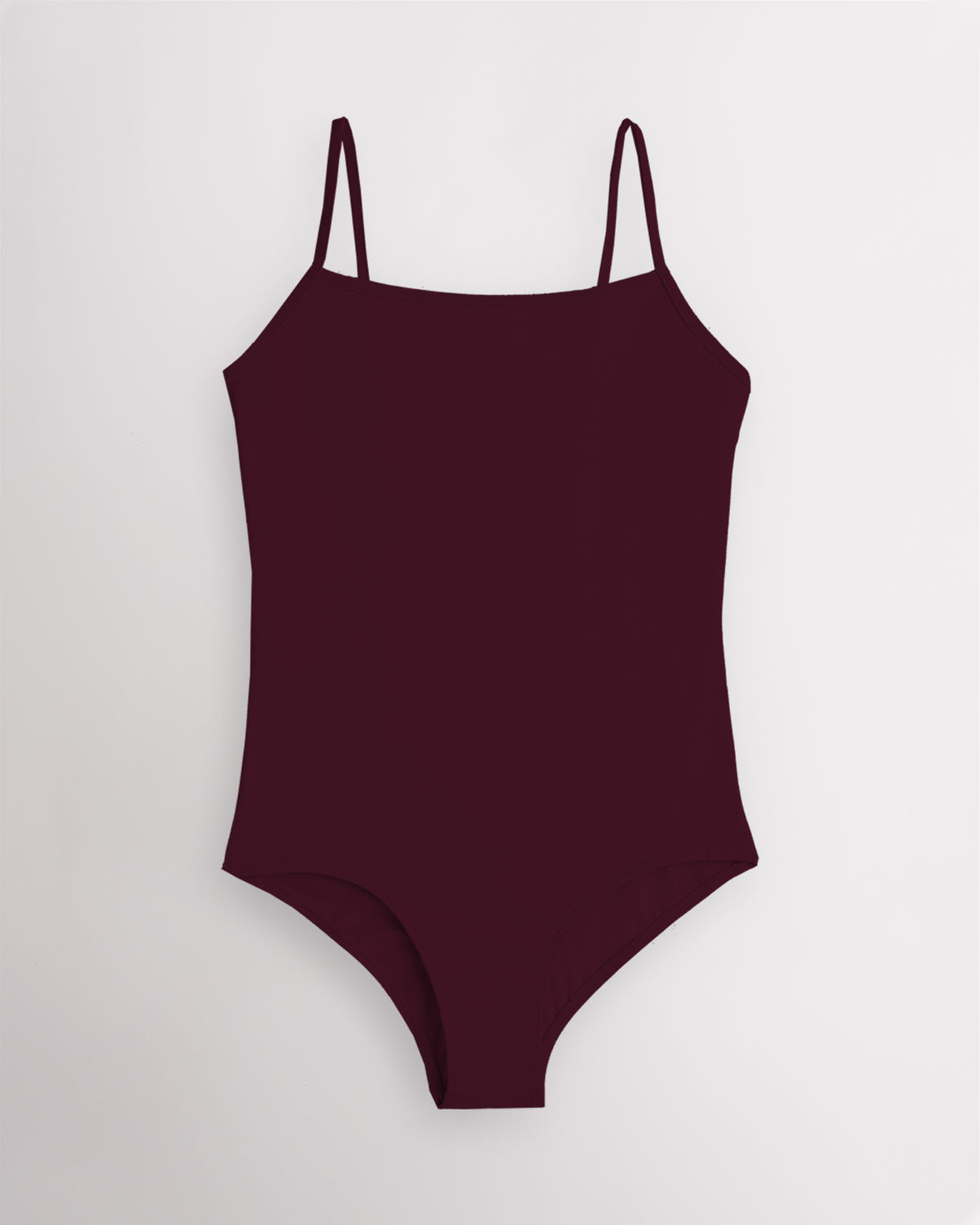 Cherry performance leotard for women with adjustable spaghetti straps, scoop neckline, supportive shelf lining, and a fitted silhouette for ballet and dance.