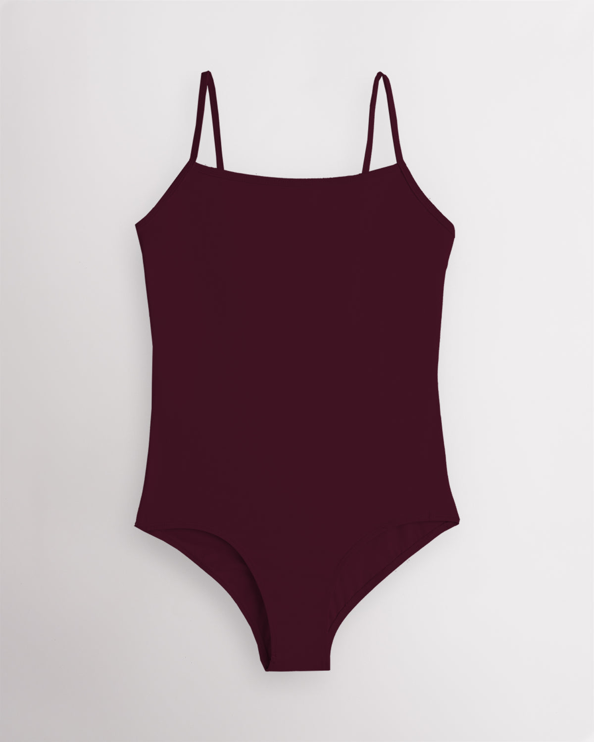 Cherry performance leotard for women with adjustable spaghetti straps, scoop neckline, supportive shelf lining, and a fitted silhouette for ballet and dance.