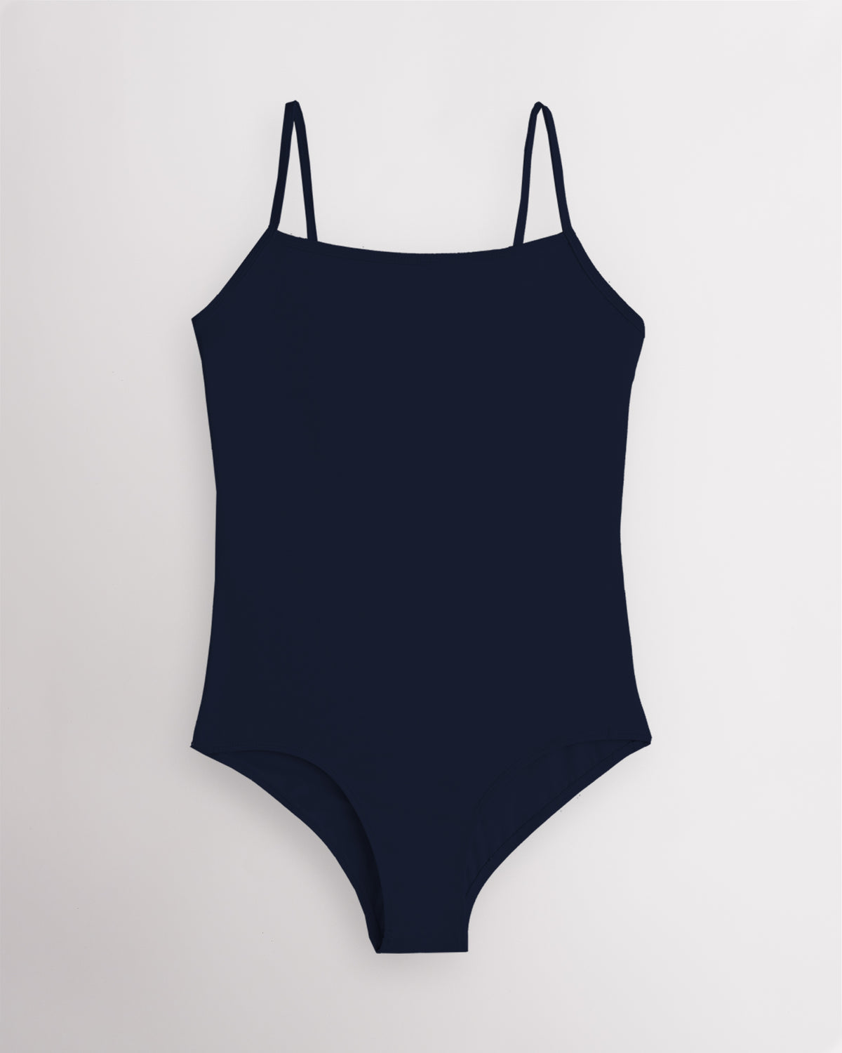 Navy performance leotard for women with adjustable spaghetti straps, scoop neckline, supportive shelf lining, and a fitted silhouette for ballet and dance.