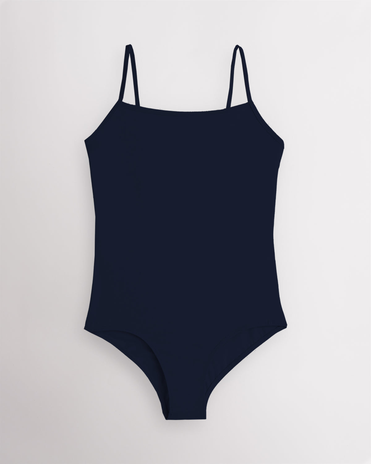 Navy performance leotard for women with adjustable spaghetti straps, scoop neckline, supportive shelf lining, and a fitted silhouette for ballet and dance.