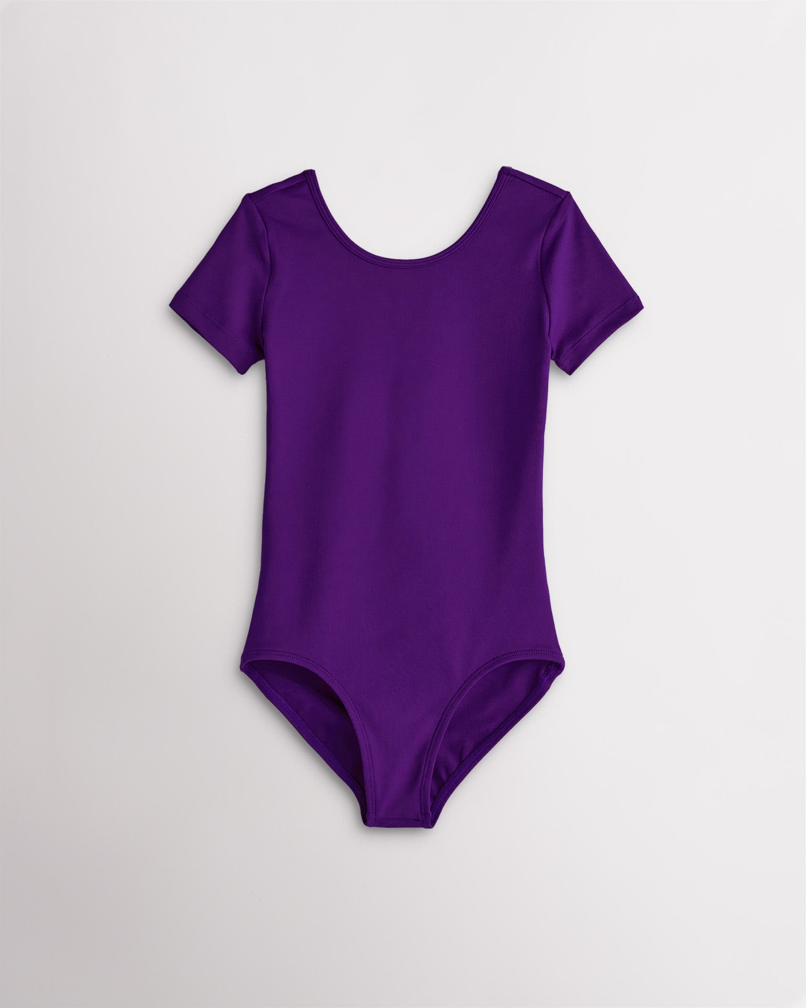 Girls purple short sleeve leotard with scoop neckline and fitted stretch design for dance and ballet.