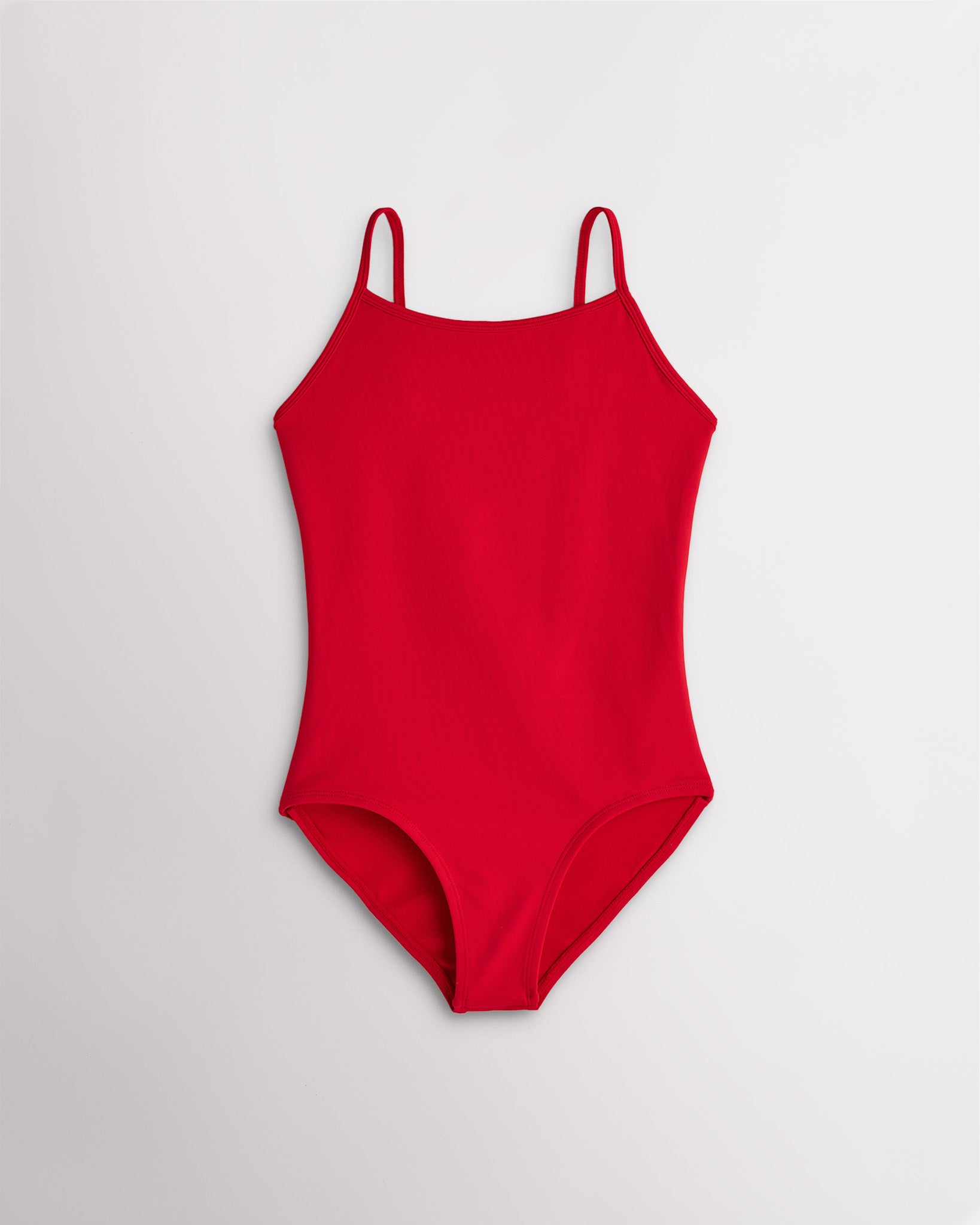 Girls cherry camisole leotard with adjustable straps and smooth stretch fabric for ballet and gymnastics.