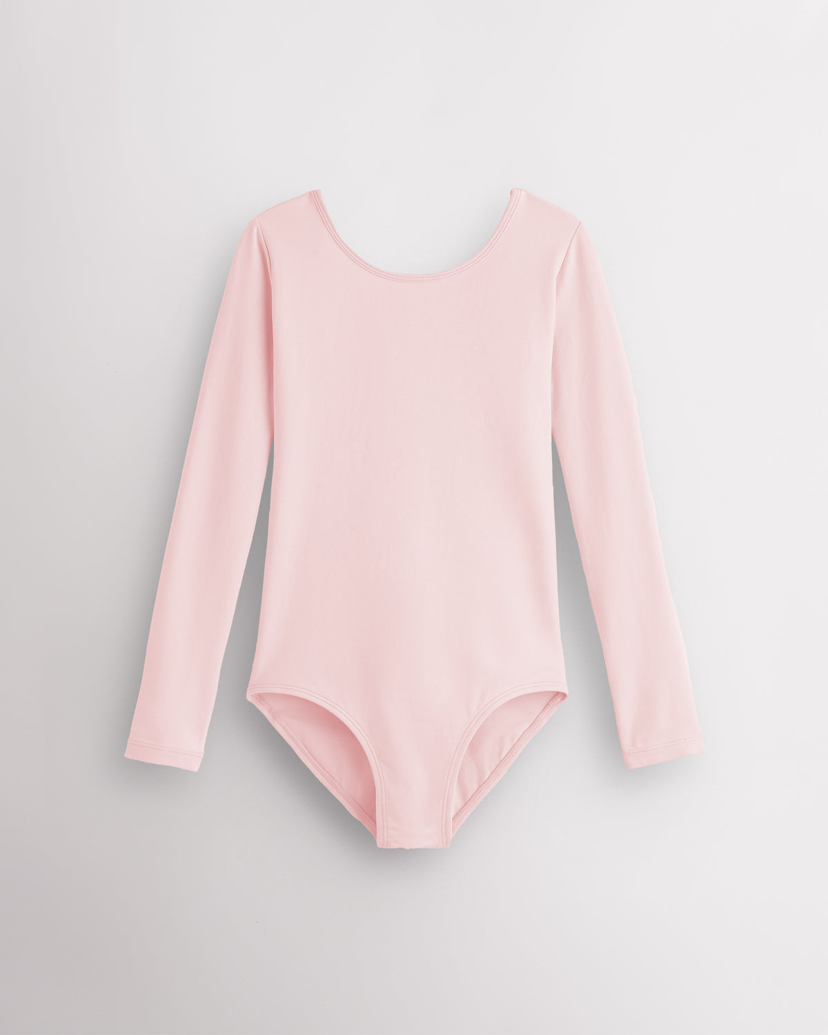 Ballet Pink girls long sleeve cotton leotard with round neckline, fitted silhouette, and front lining for ballet and dance.
