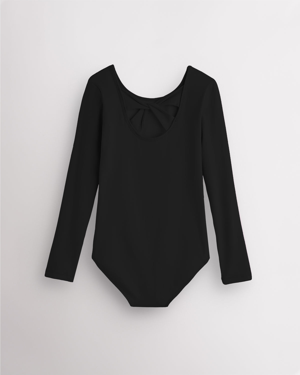 Back view of black long sleeve leotard for girls with twist-back bow detail and soft cotton fabric.