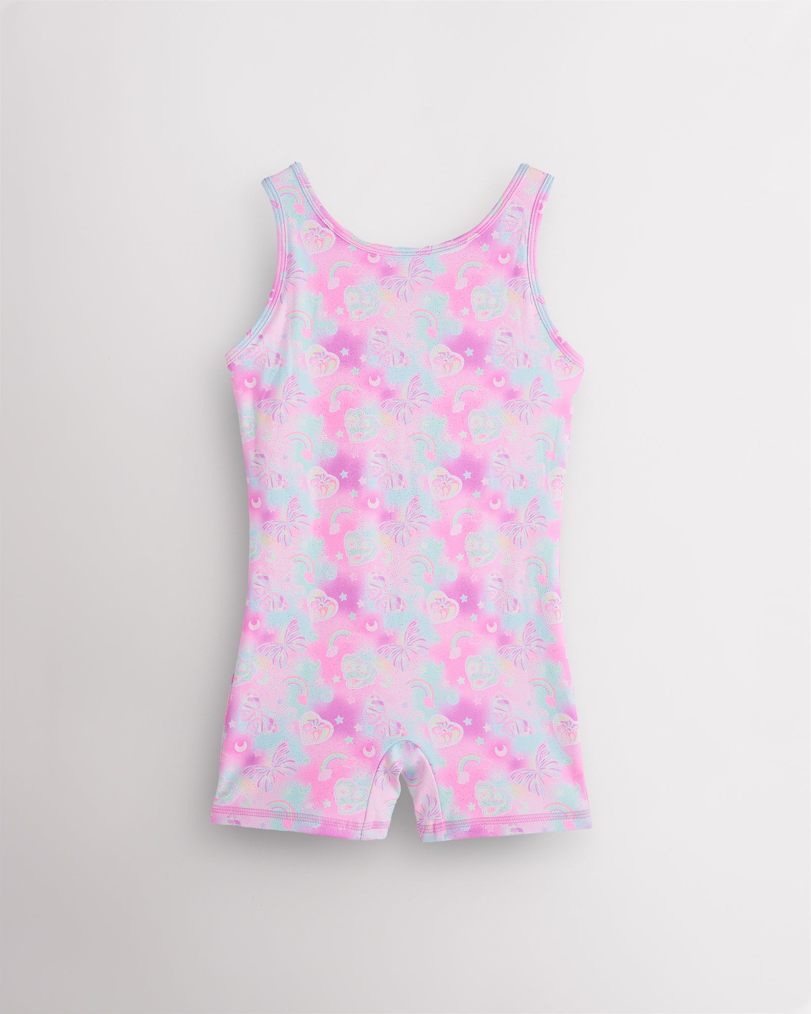Bow Dreams girls gymnastics unitard with built-in shorts, sleeveless tank design, round neckline, and playful in-house print.