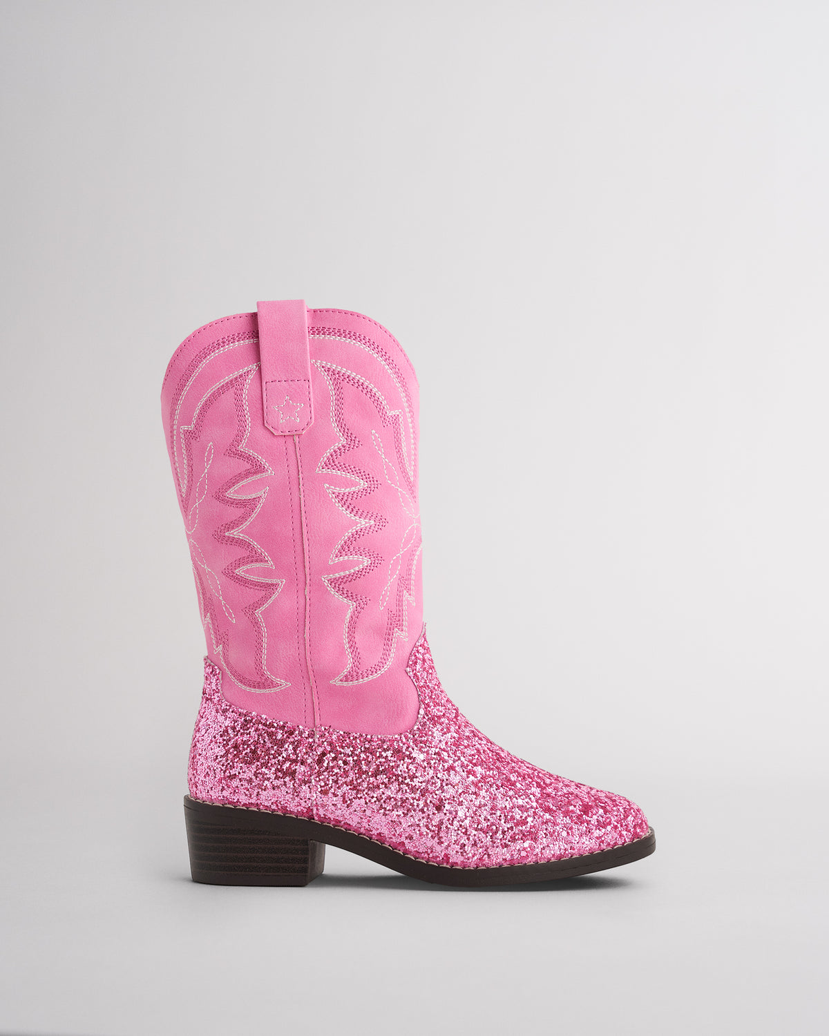 Girls pink glitter cowboy boot with embroidered western shaft and low block heel, side view