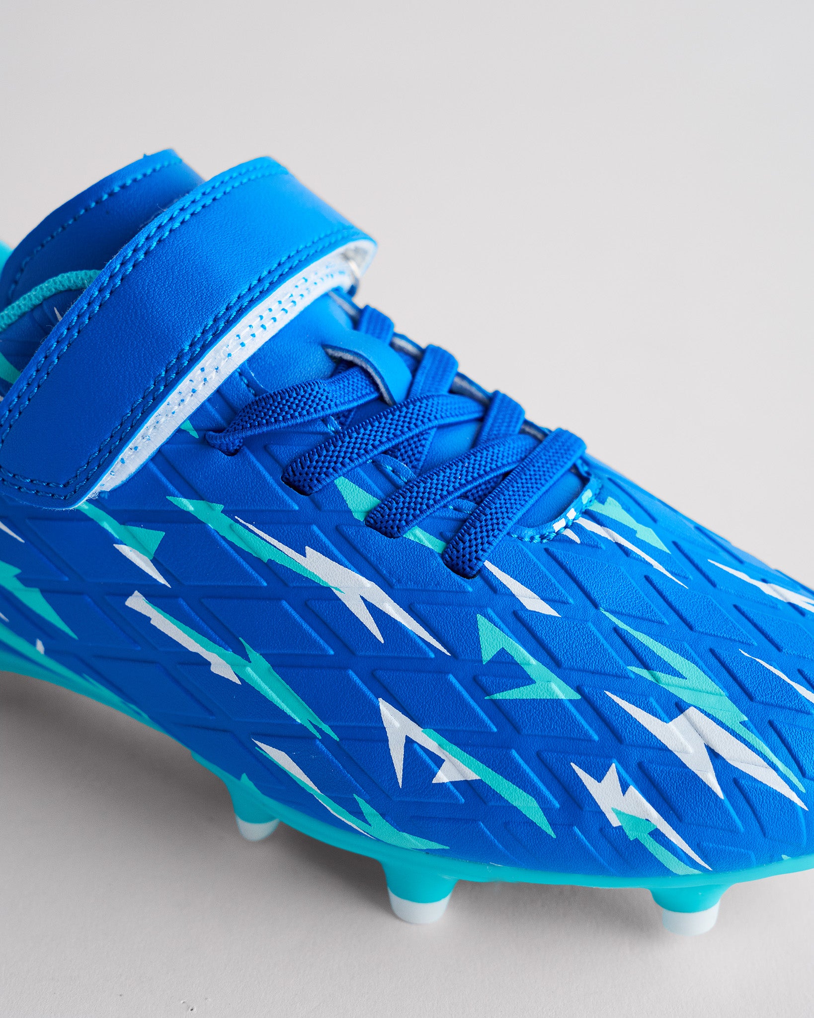 In A Flash Kids Soccer Cleats in Electric Blue