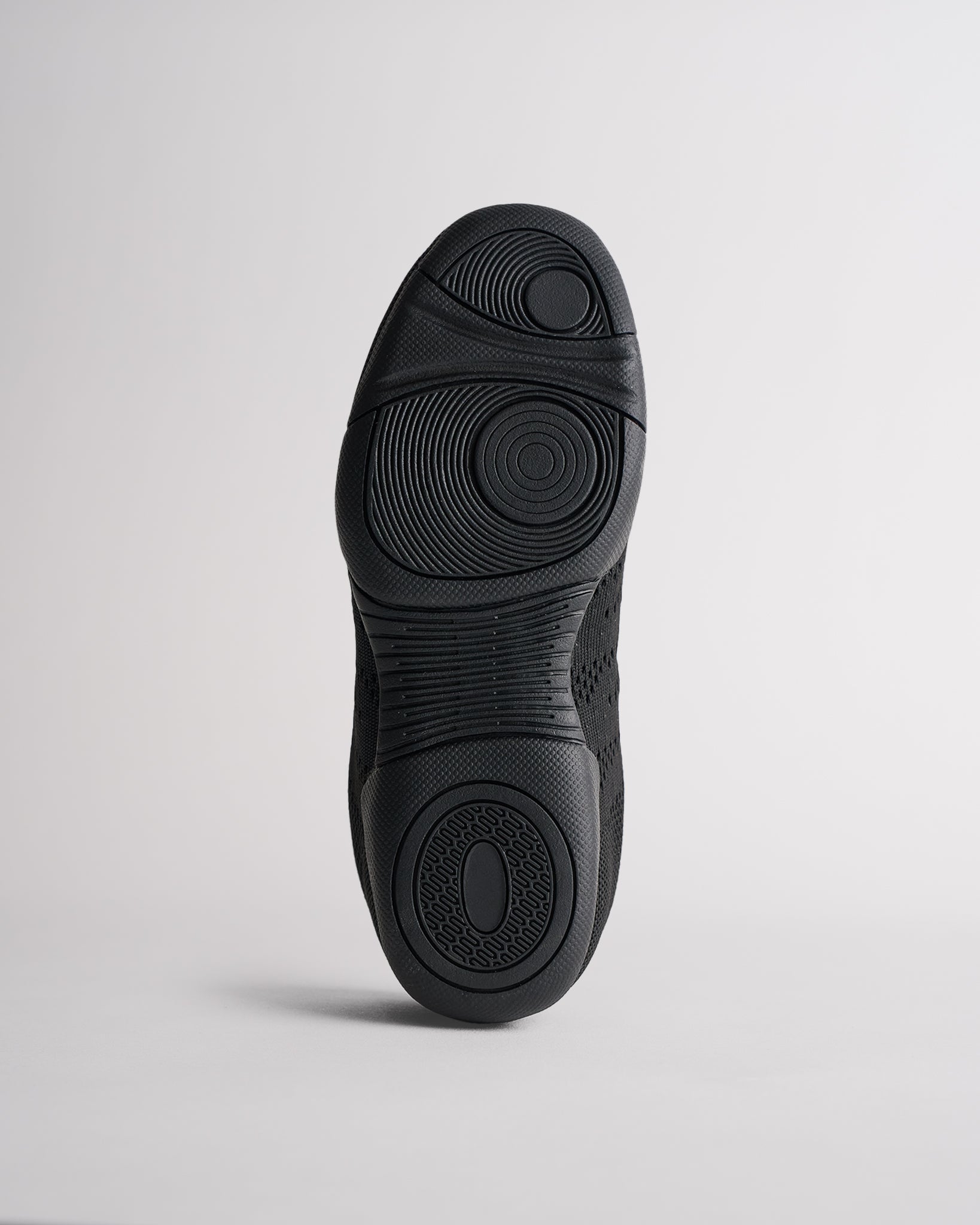 Bottom sole of kids cheer shoes showing grip pattern for traction and stability