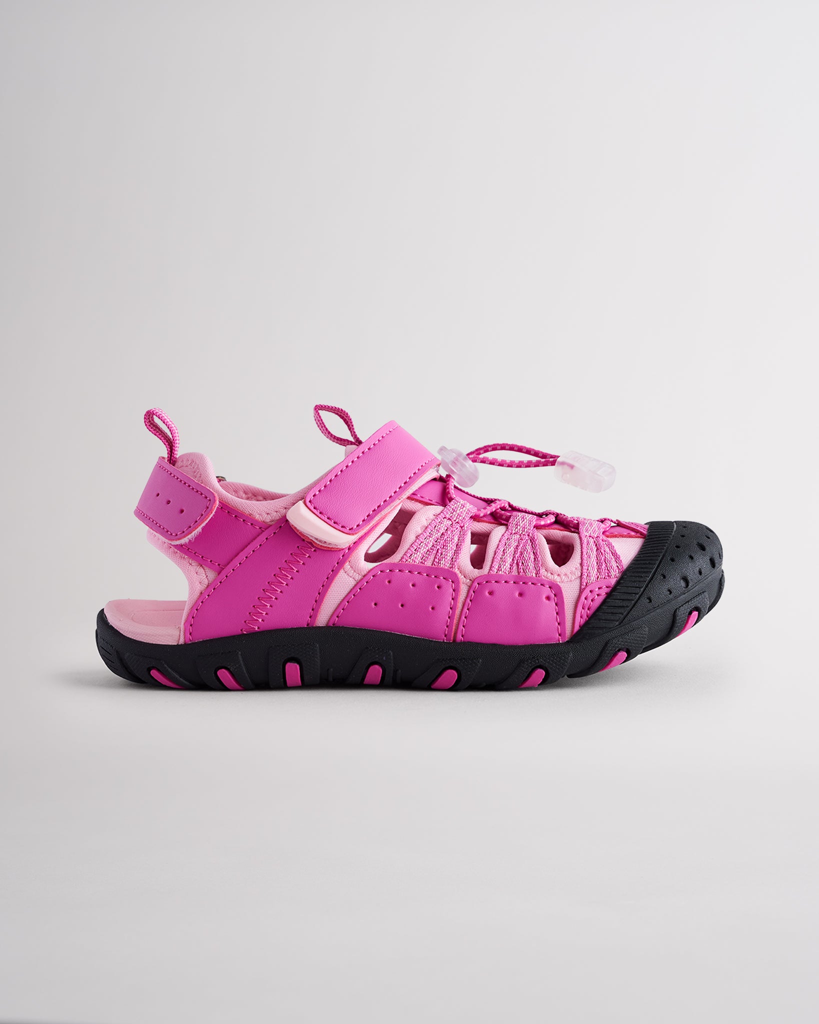 Dreamhouse Pink kids sport sandal with closed-toe protection, cord lace system, and adjustable hook-and-loop strap