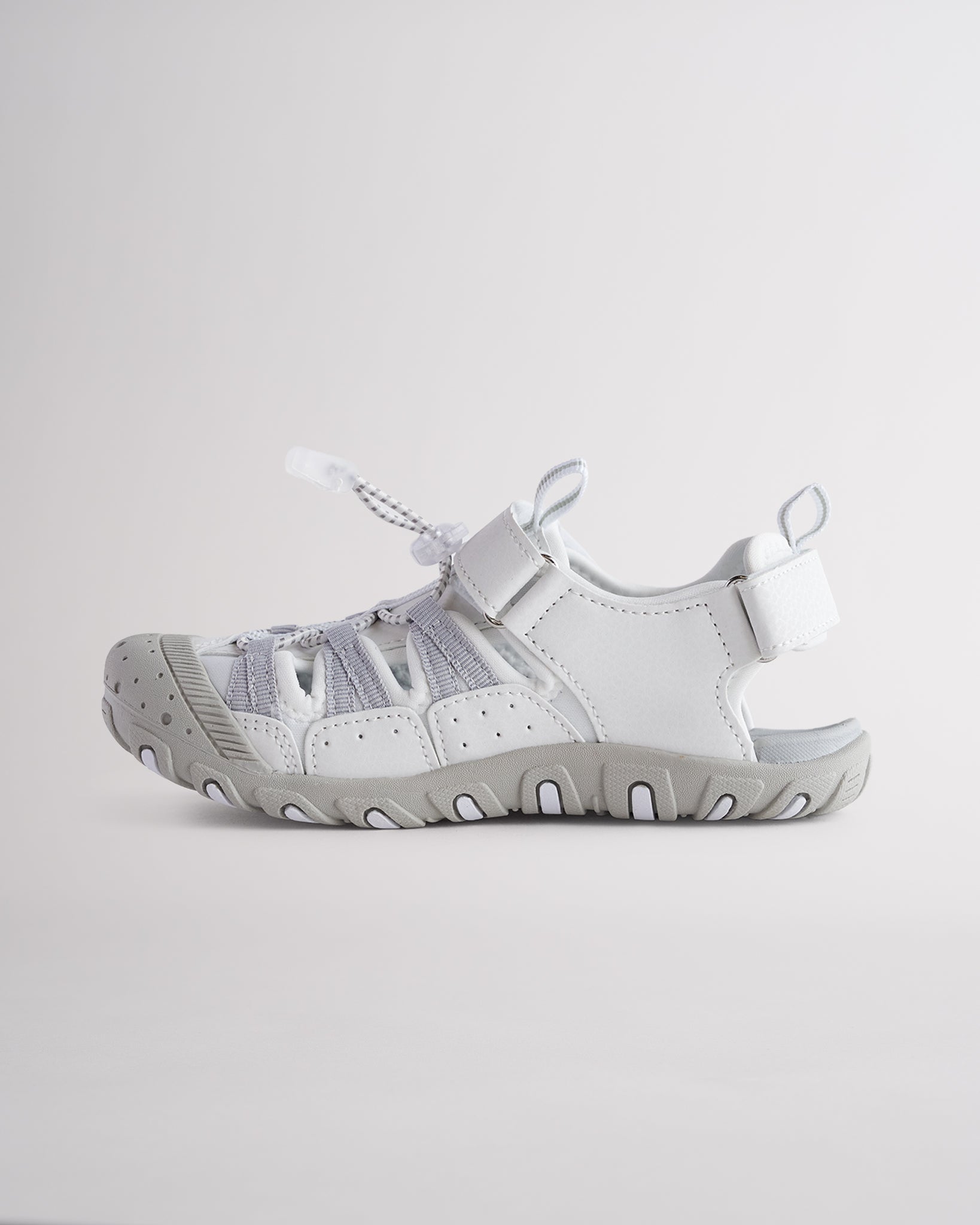 Kids sandals with secure strap closure, breathable design, and rugged outsole for outdoor activities
