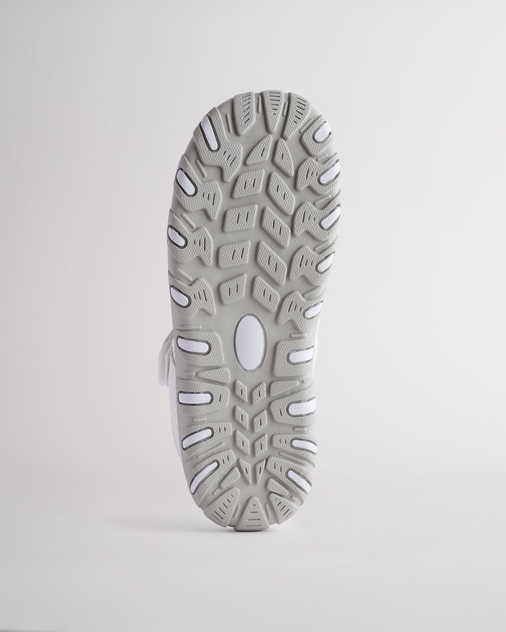 High-traction rubber outsole on kids sandal designed for grip and durability
