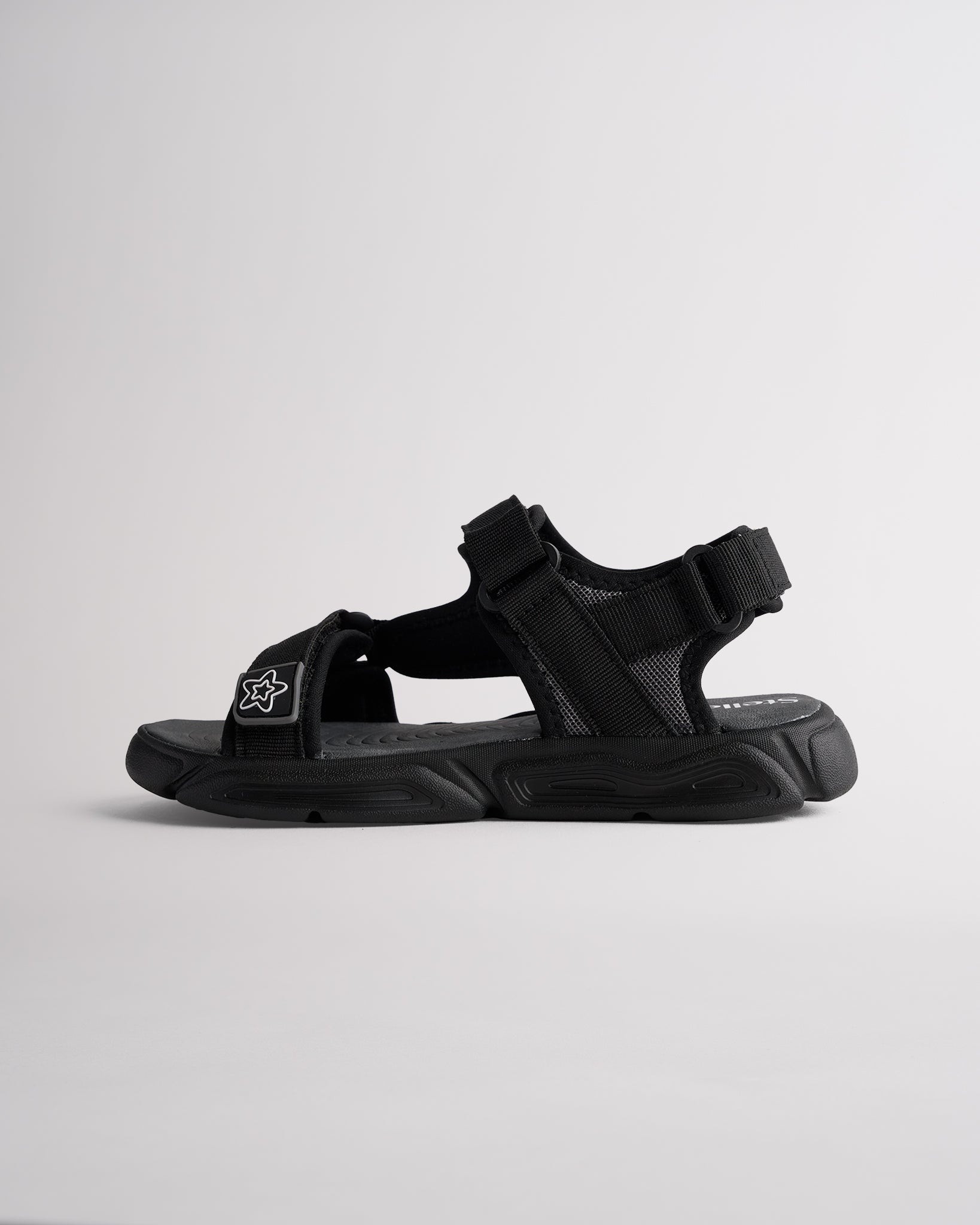 Kids sport sandals with hook-and-loop straps and durable grippy outsole