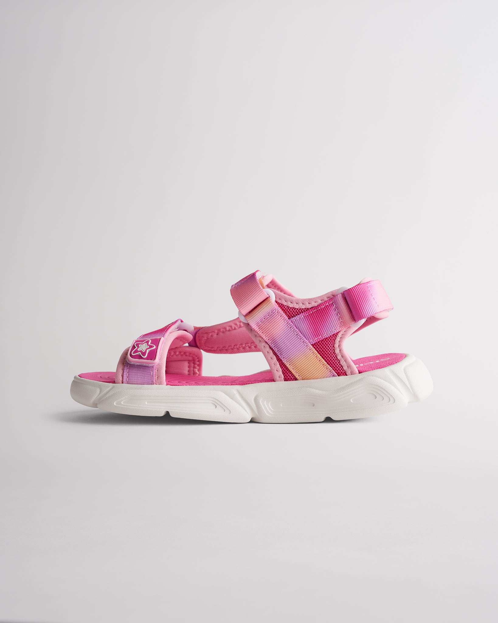Kids sport sandals with hook-and-loop straps and durable grippy outsole