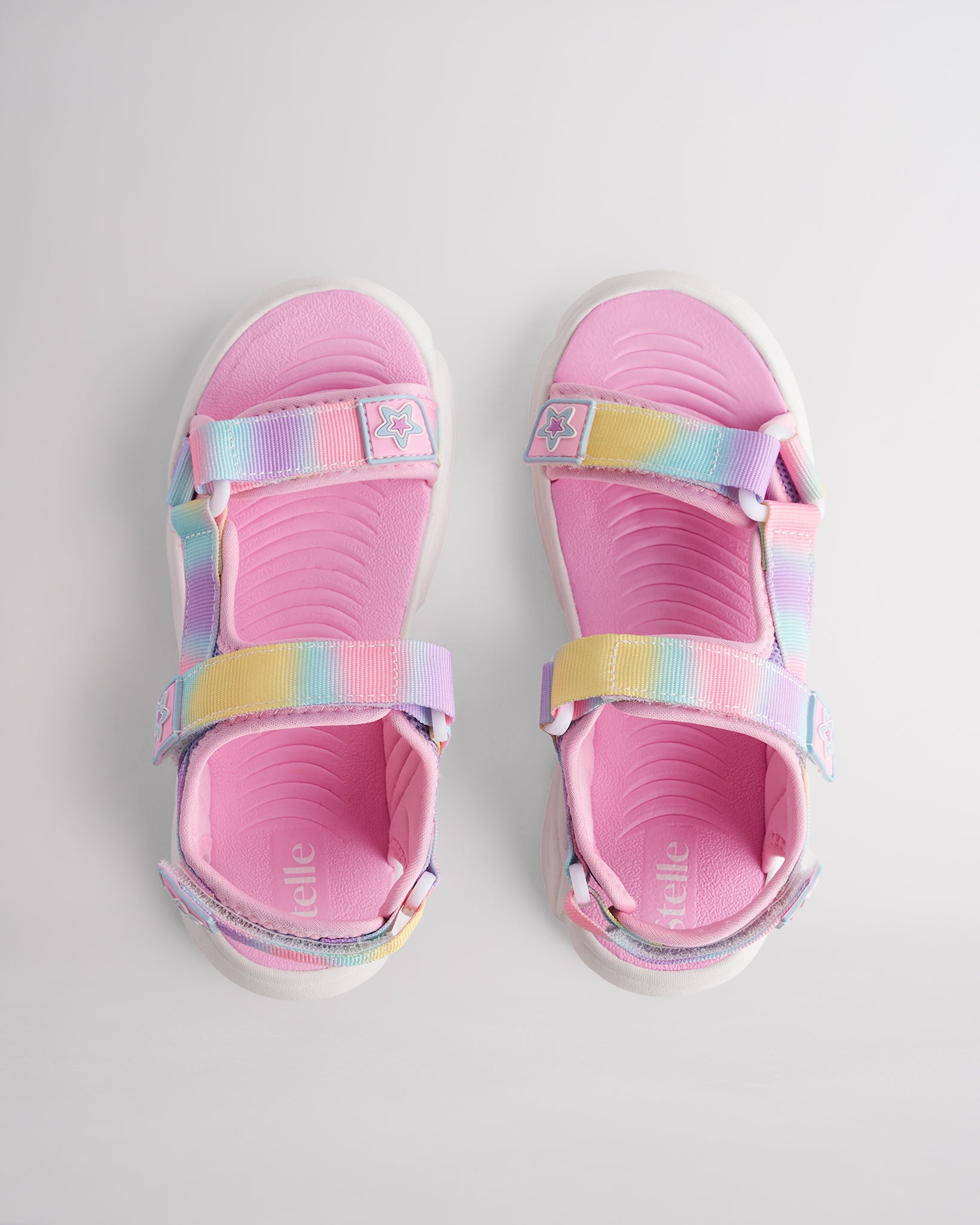 Top view of rainbow sandals for kids with three adjustable straps and textured footbed