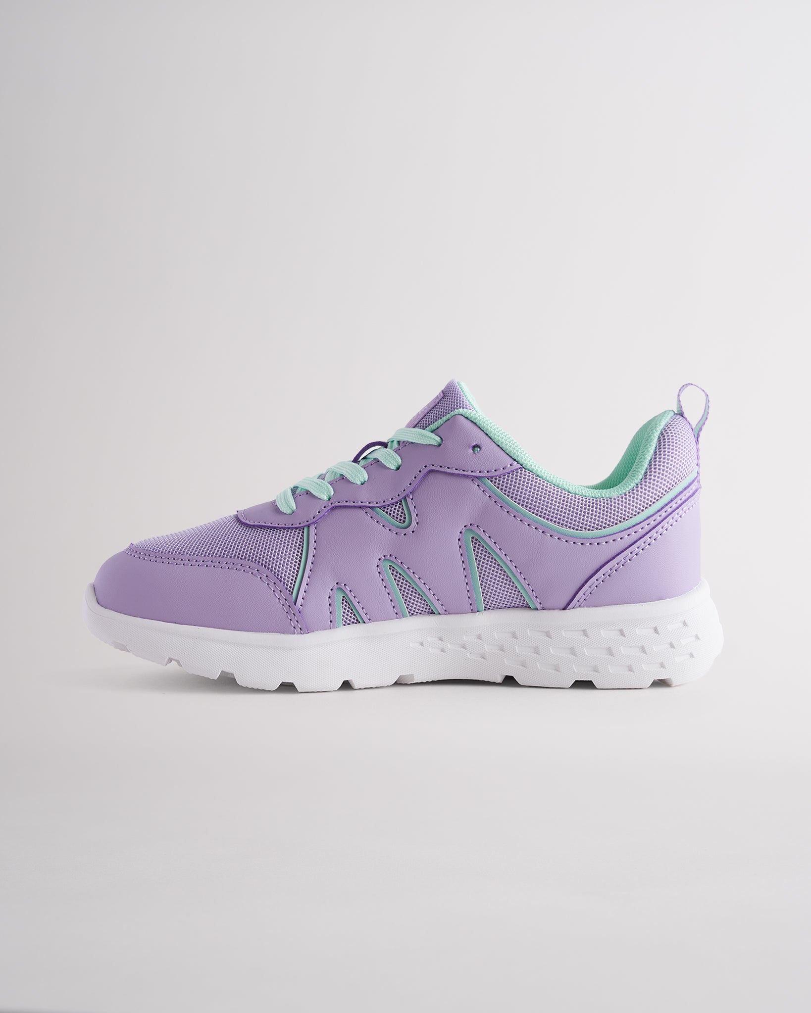 Lavender lightweight kids’ sneakers with breathable mesh uppers, a cushioned insole, and a durable outsole.