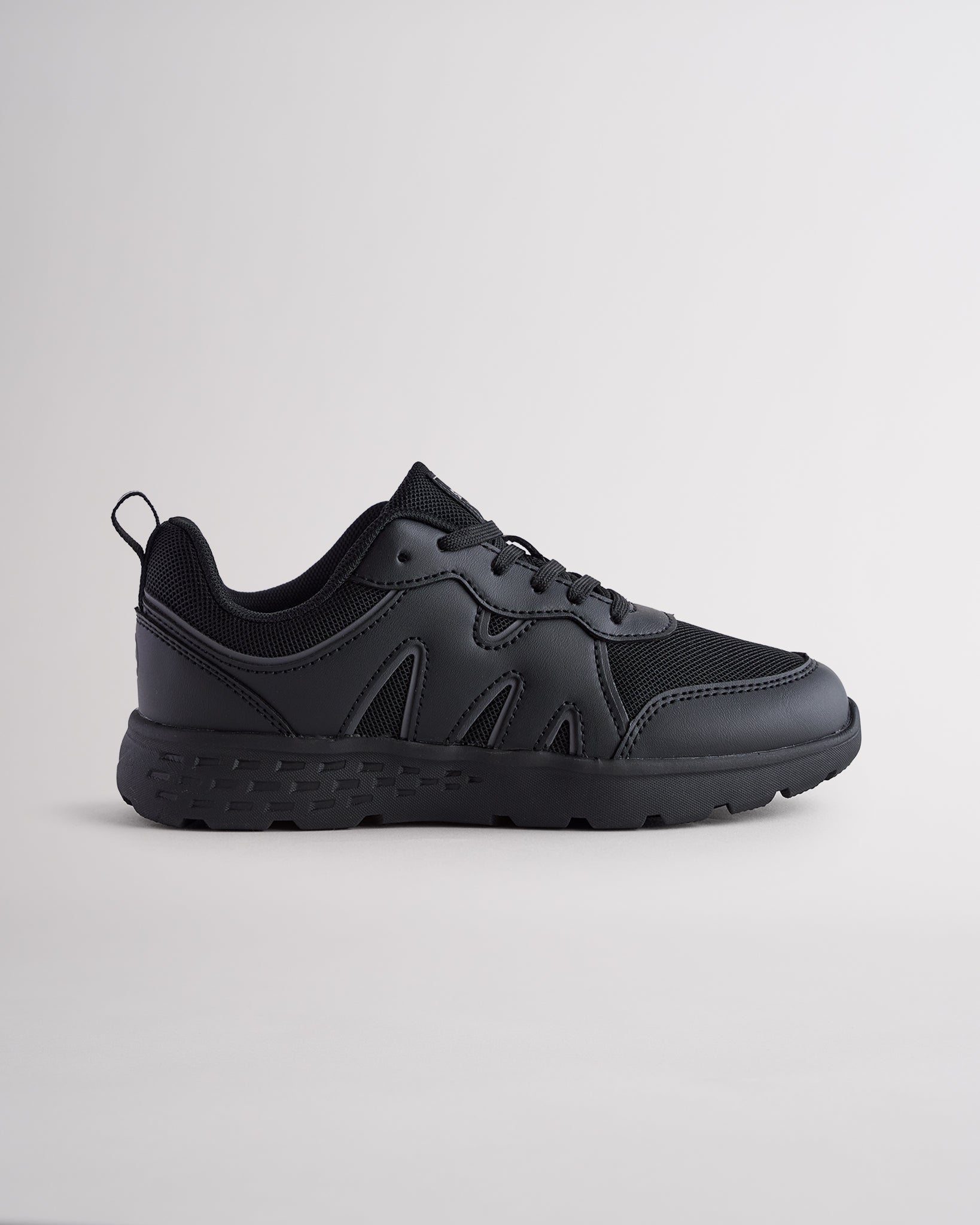 Ninja Black lightweight kids’ sneakers with breathable mesh uppers, a cushioned insole, and a durable outsole.