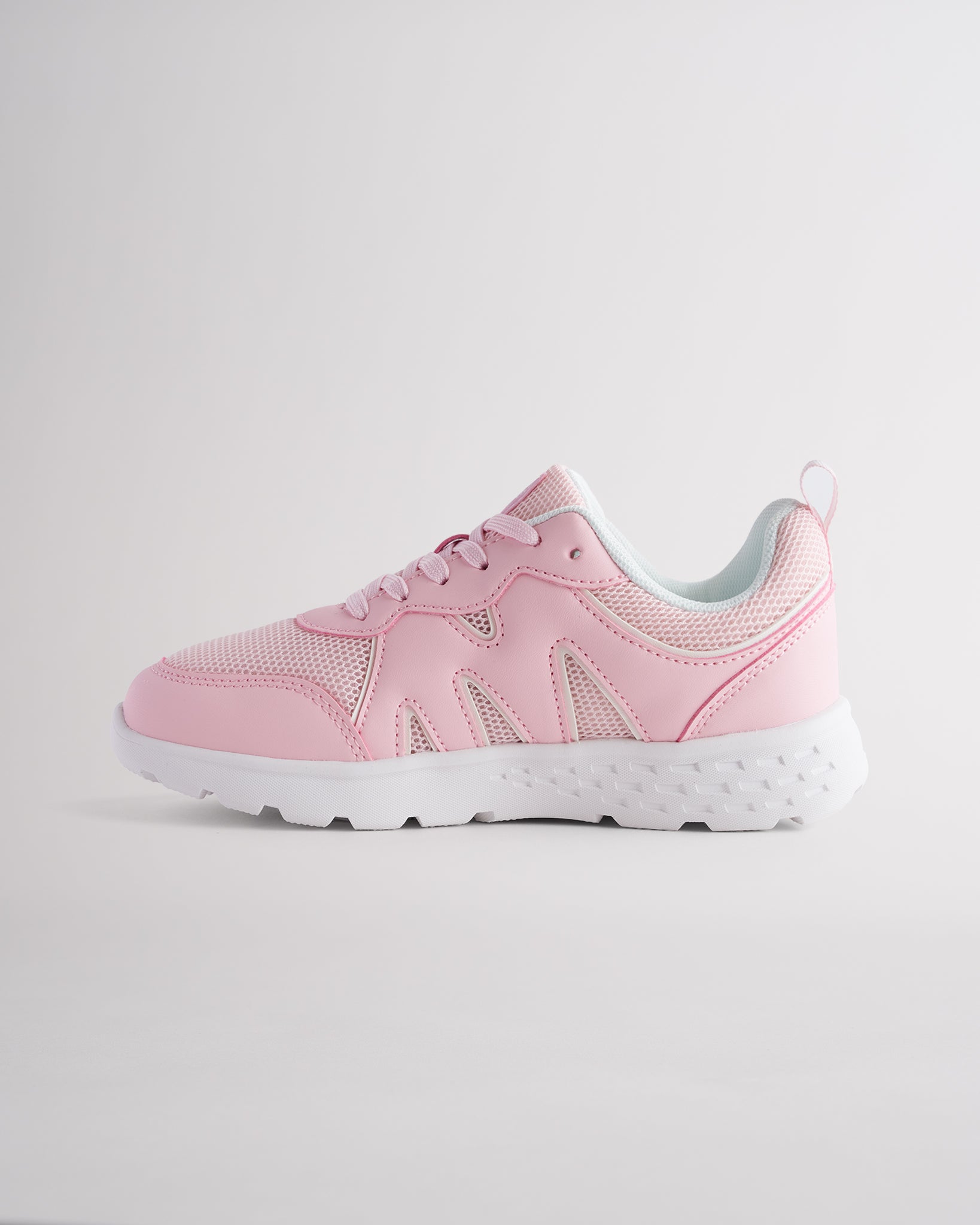 Pink lightweight kids’ sneakers with breathable mesh uppers, a cushioned insole, and a durable outsole.