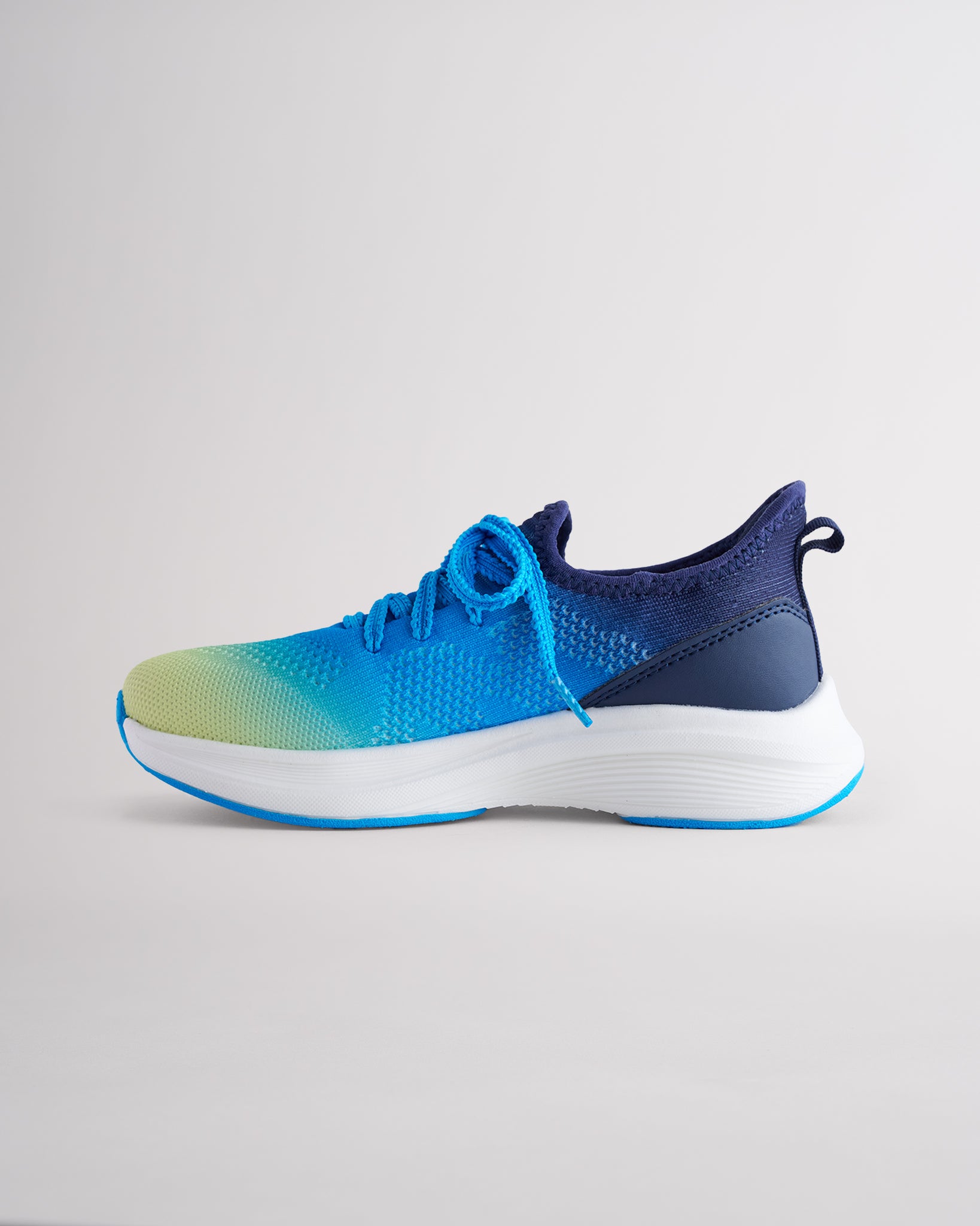 Kids Lume Lagoon lace-up running sneakers with cushioned white sole.