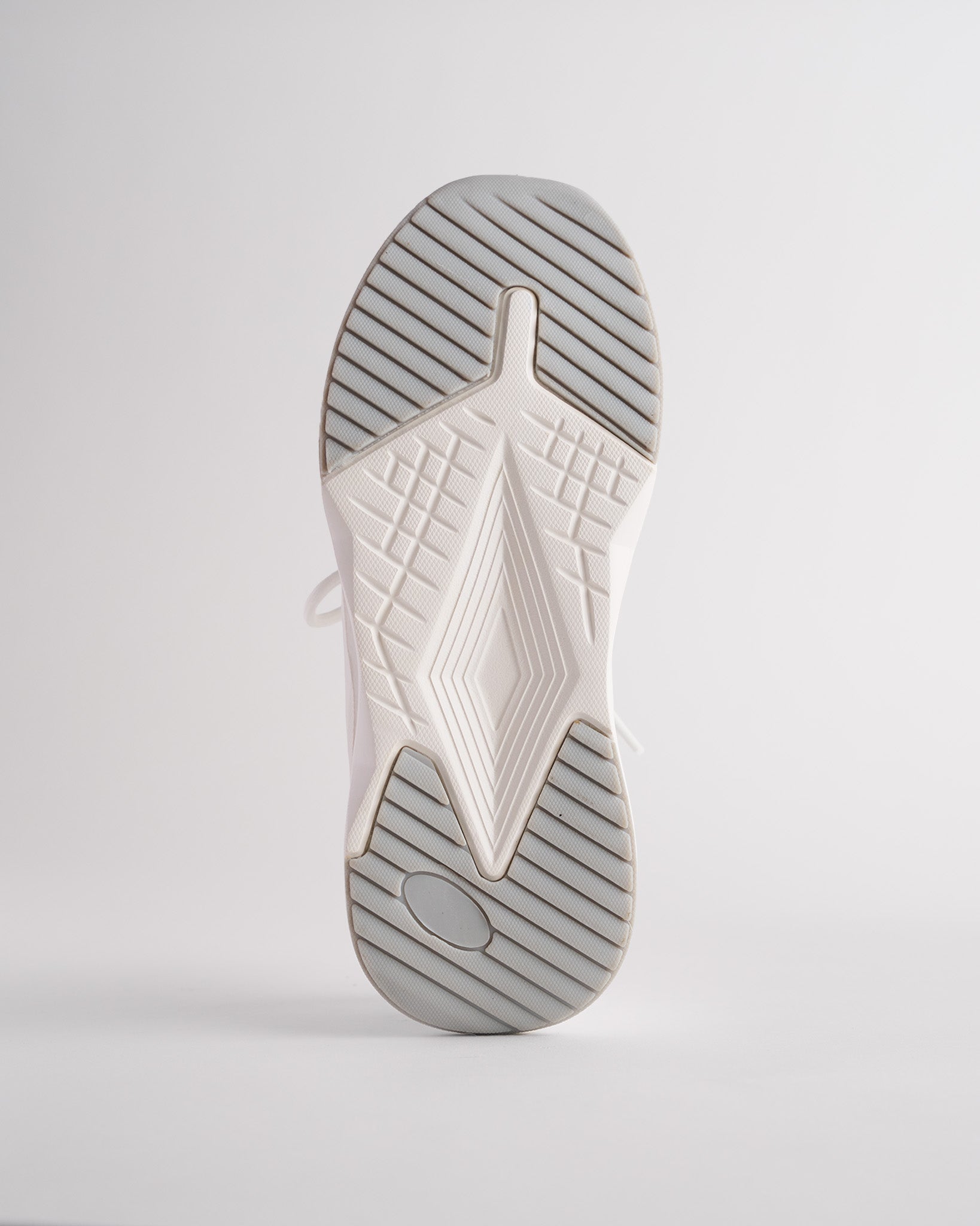 kids running shoes in white