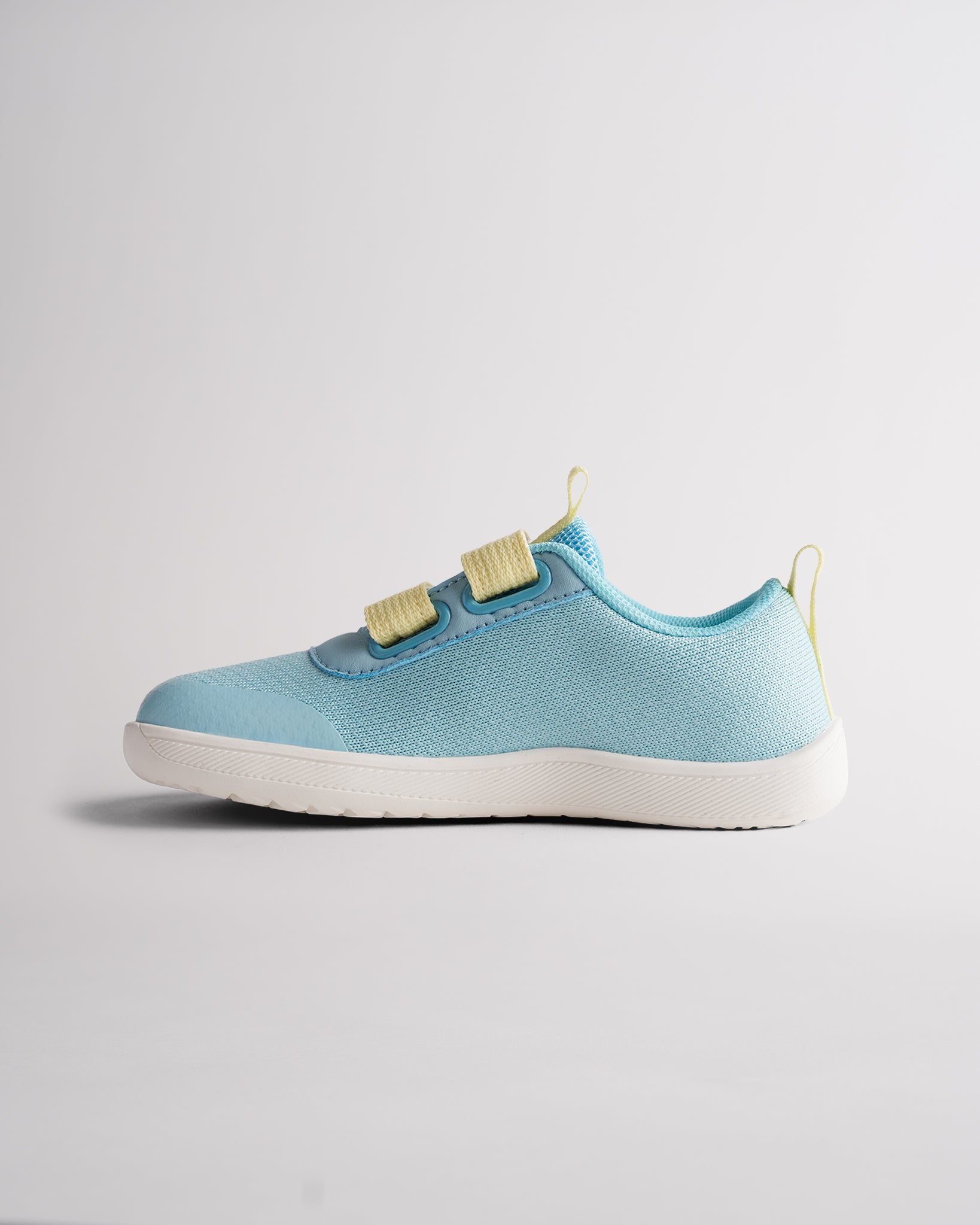 Lightweight kids barefoot shoes with adjustable hook-and-loop straps and flexible sole