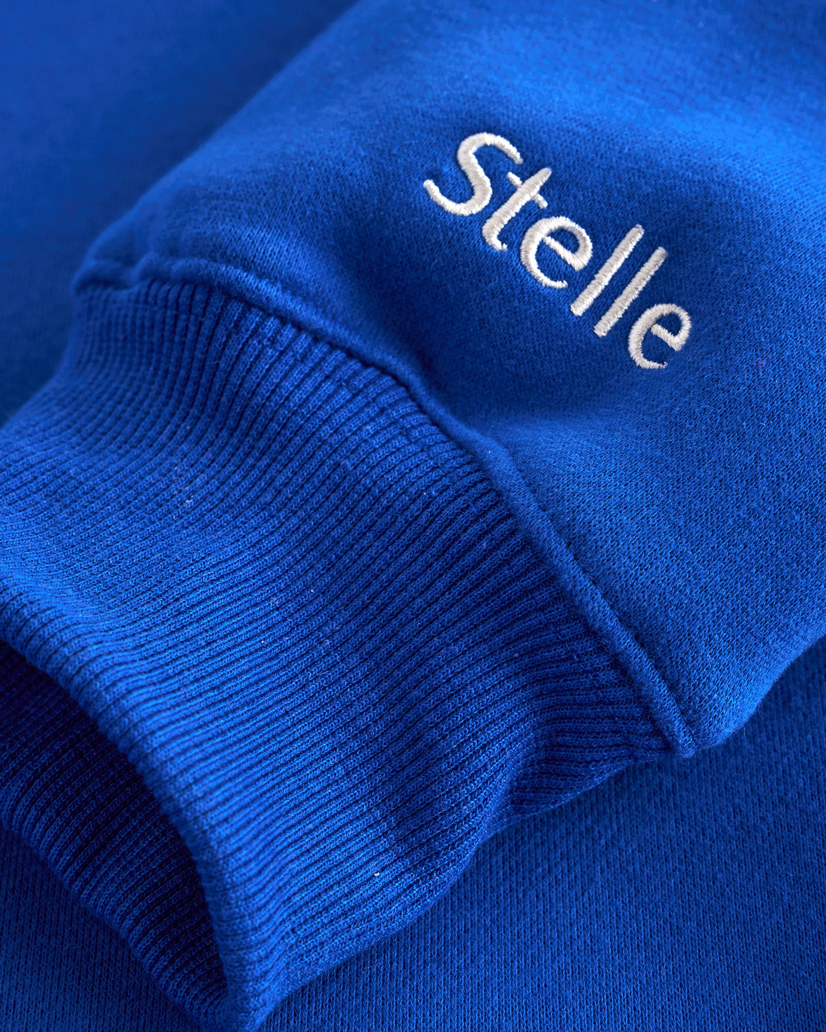 Women’s Oversized Fleece Hoodie with Embroidered Cuff in Blue