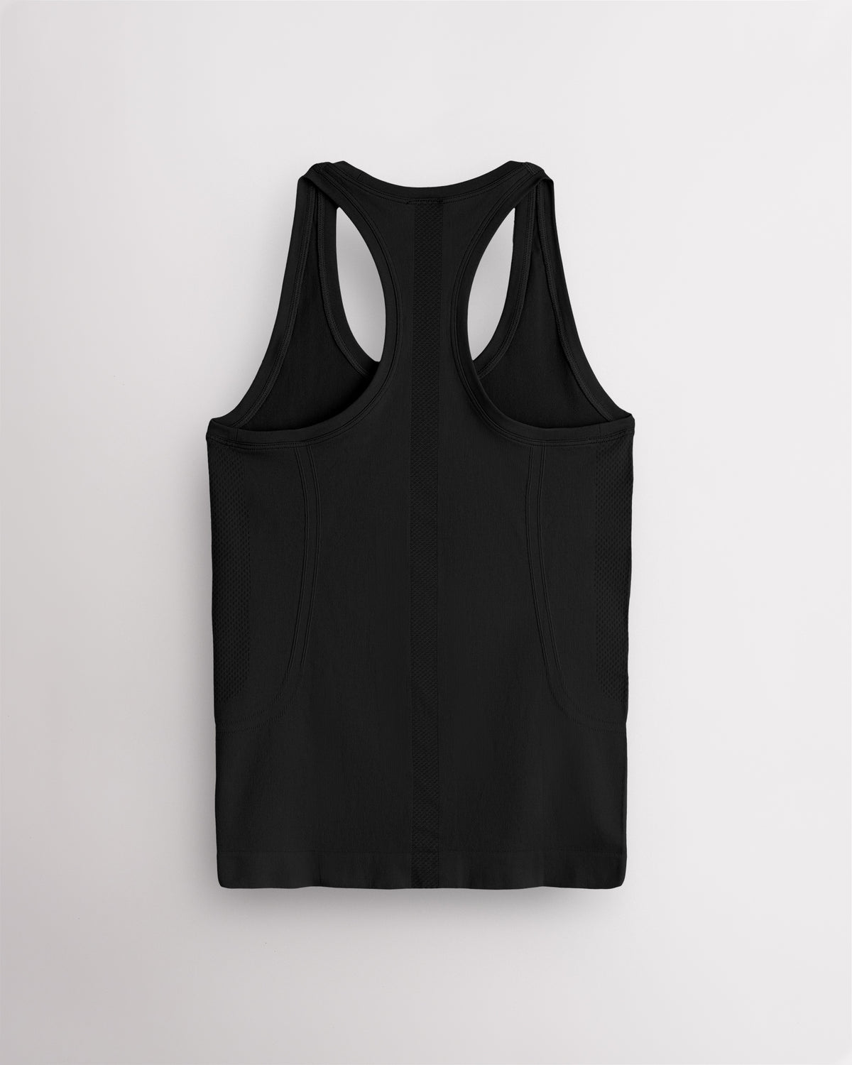 Back view of the black Stelle seamless tank top, laid flat to show the racerback straps.