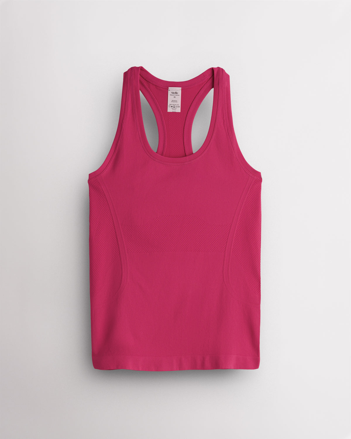 Dreamhouse Pink Stelle women's seamless racerback tank top in bright pink.