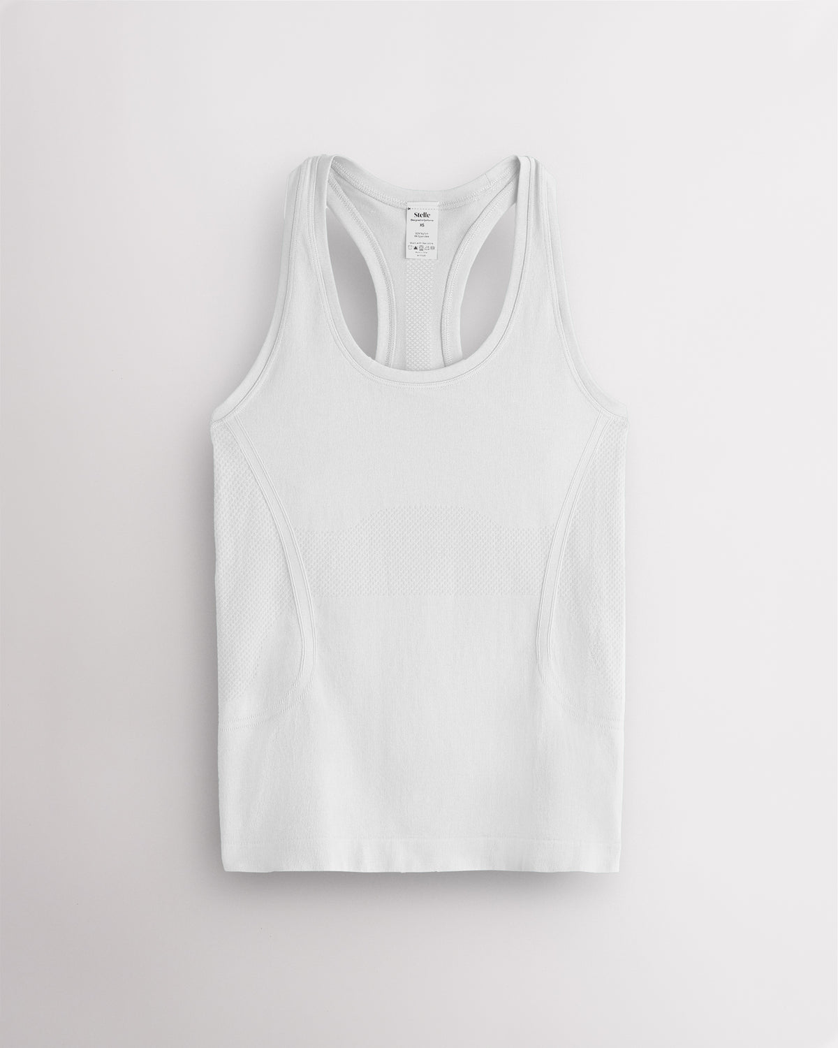 White Stelle women's seamless racerback tank top with a round neckline.