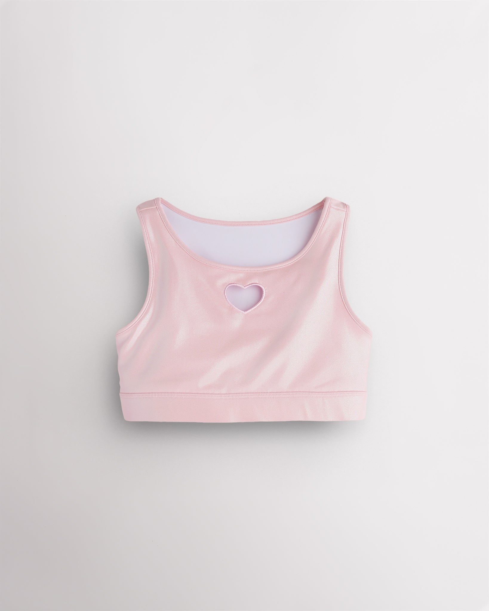 Pink girls shimmer heart crop top with sleeveless tank design, round neckline, and iridescent finish.