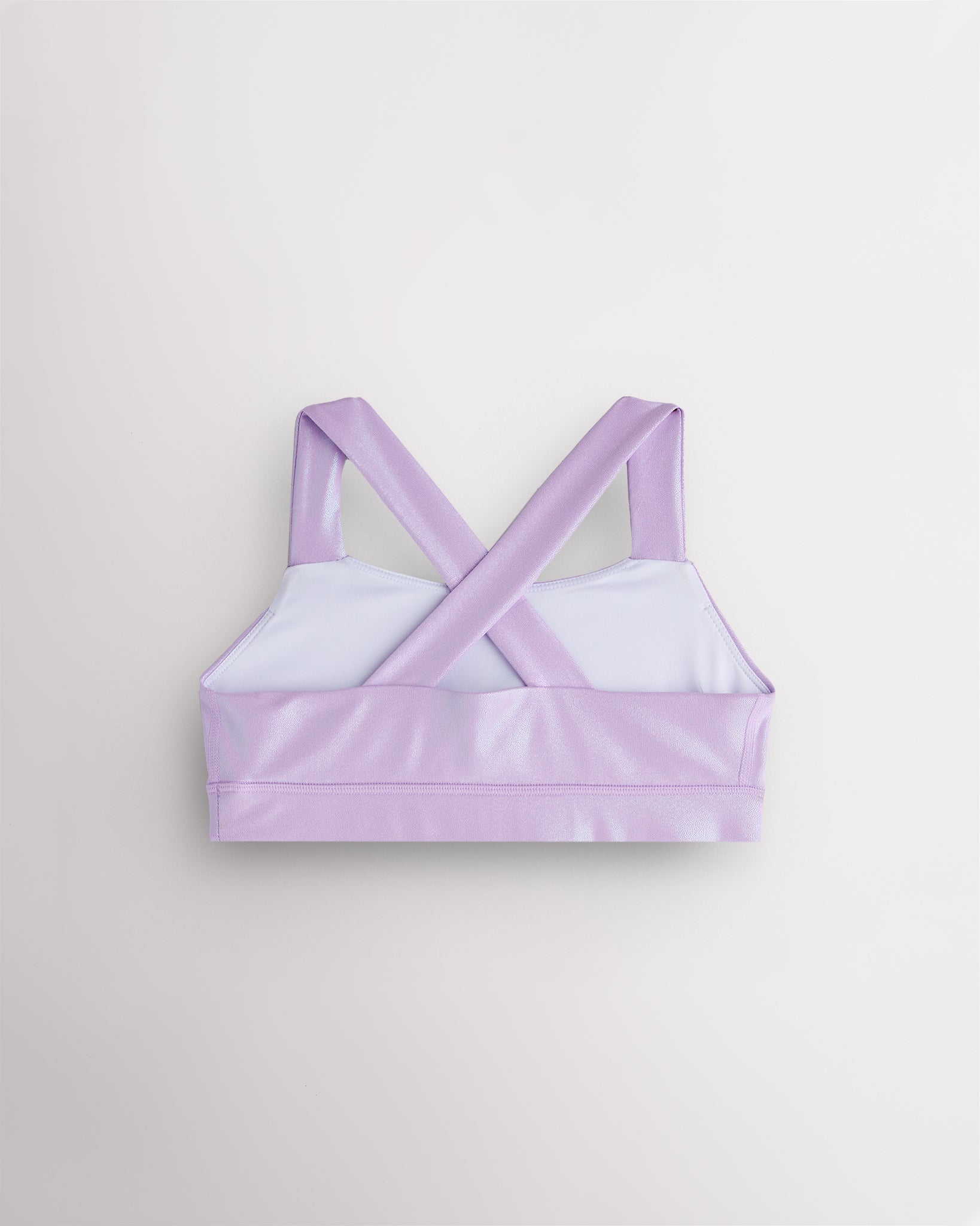 Back view of lavender metallic dance top with criss-cross racerback straps and a supportive band.