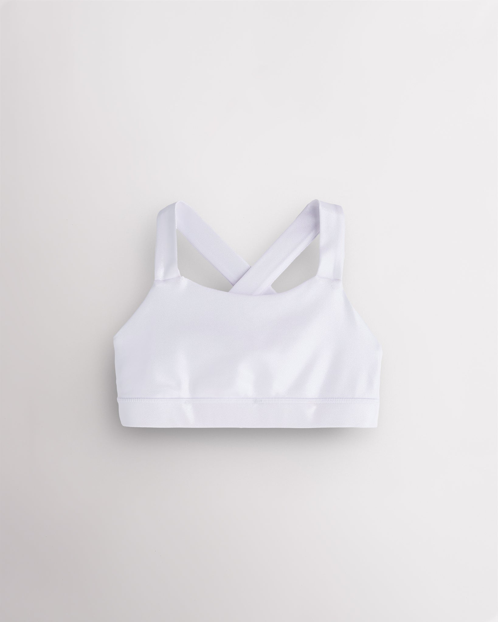 White metallic girls tank top with iridescent shimmer finish and wide straps, designed for dance and casual wear.
