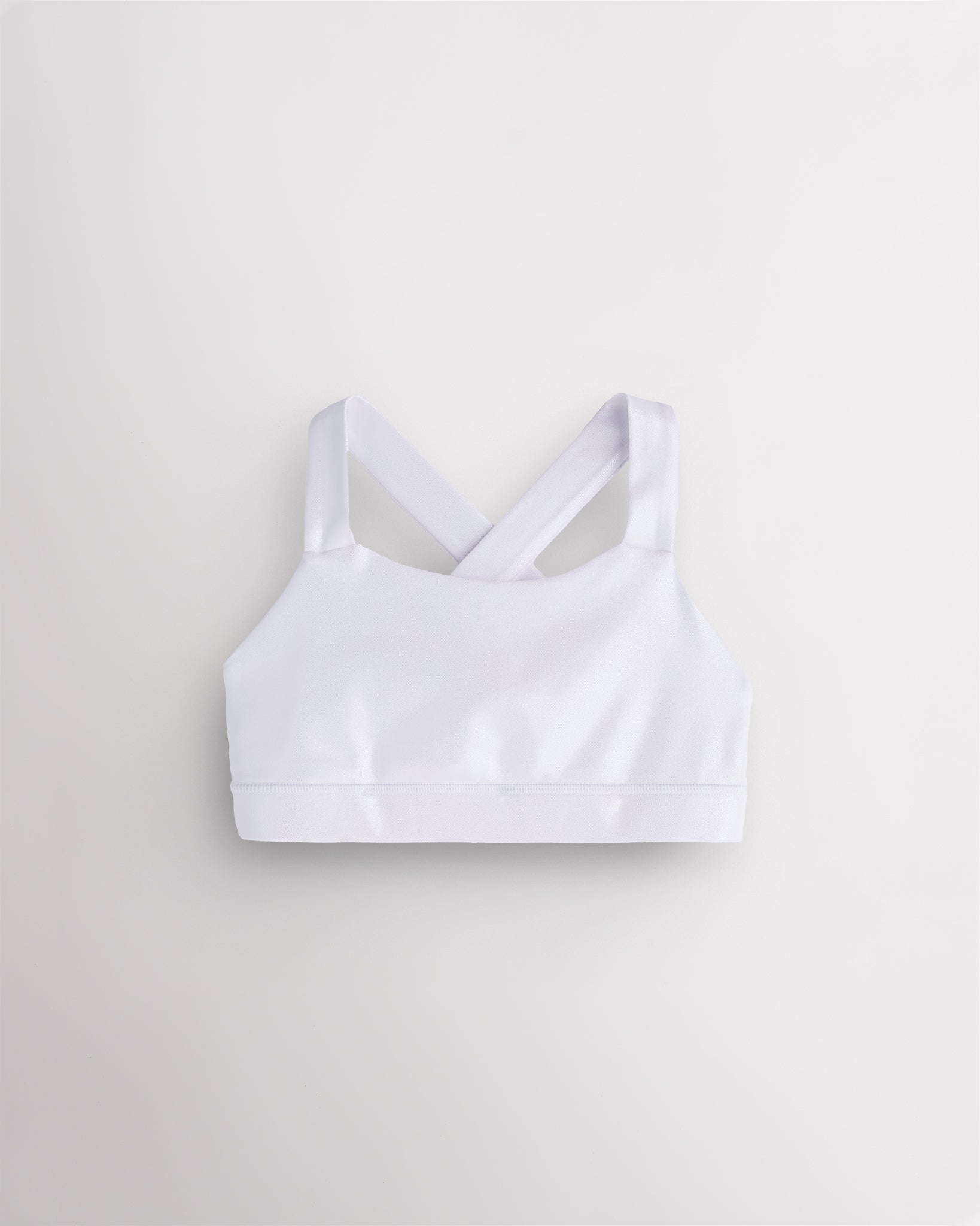 White metallic girls tank top with iridescent shimmer finish and wide straps, designed for dance and casual wear.
