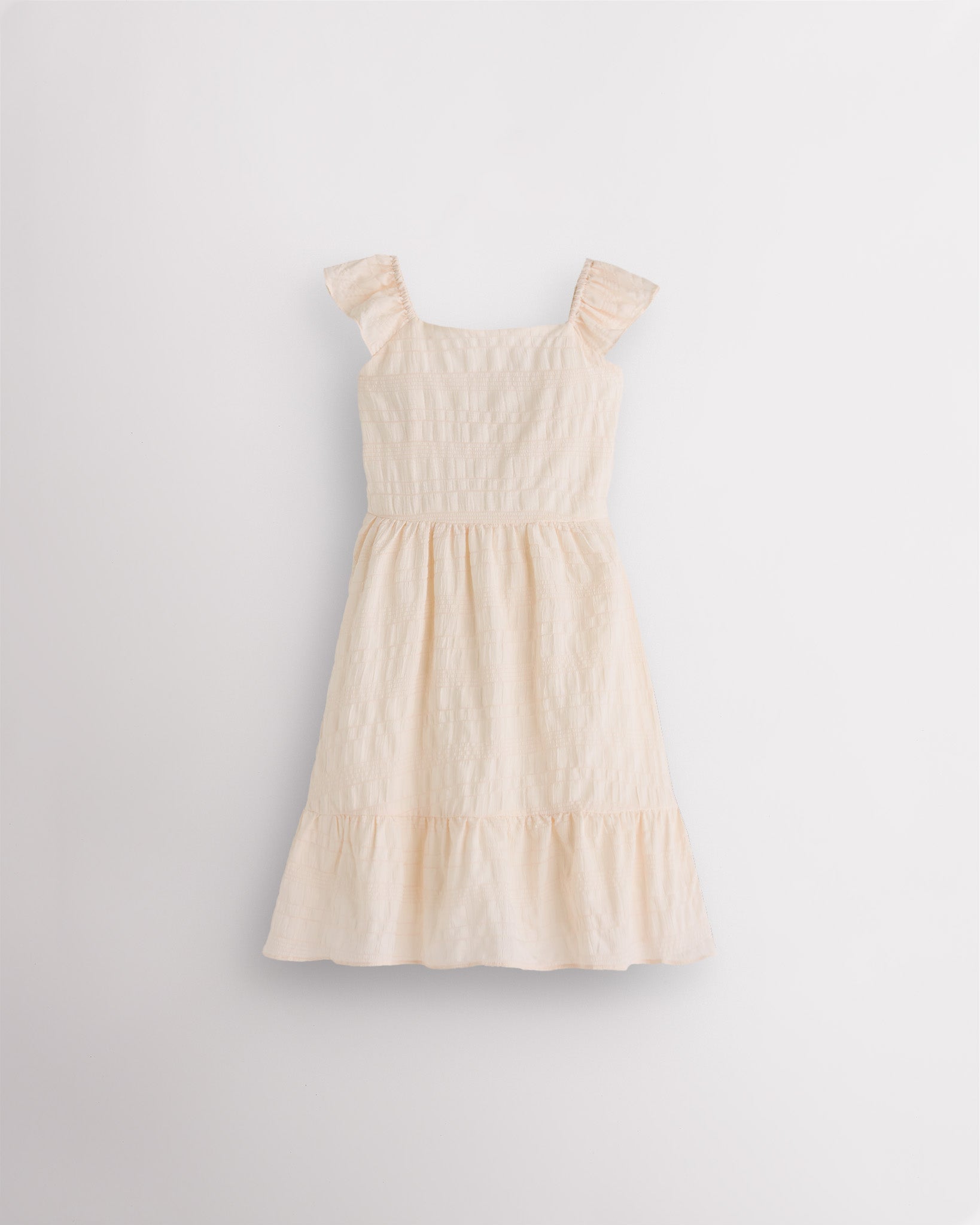 Girls butter flutter sleeve sundress with square neckline, smocked waist, and tiered hem, lightweight summer dress front view