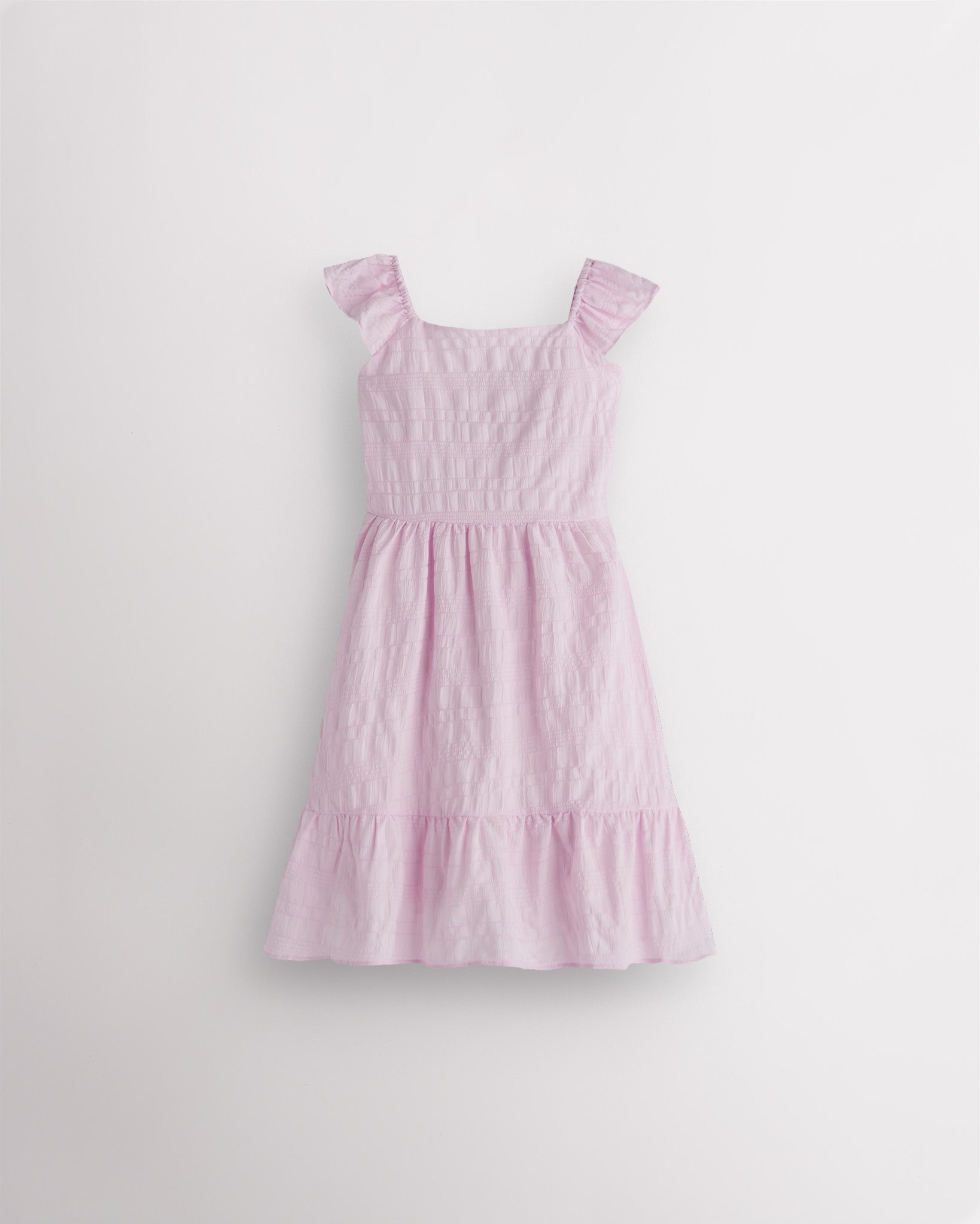 Girls lilac flutter sleeve sundress with square neckline, smocked waist, and tiered hem, lightweight summer dress front view