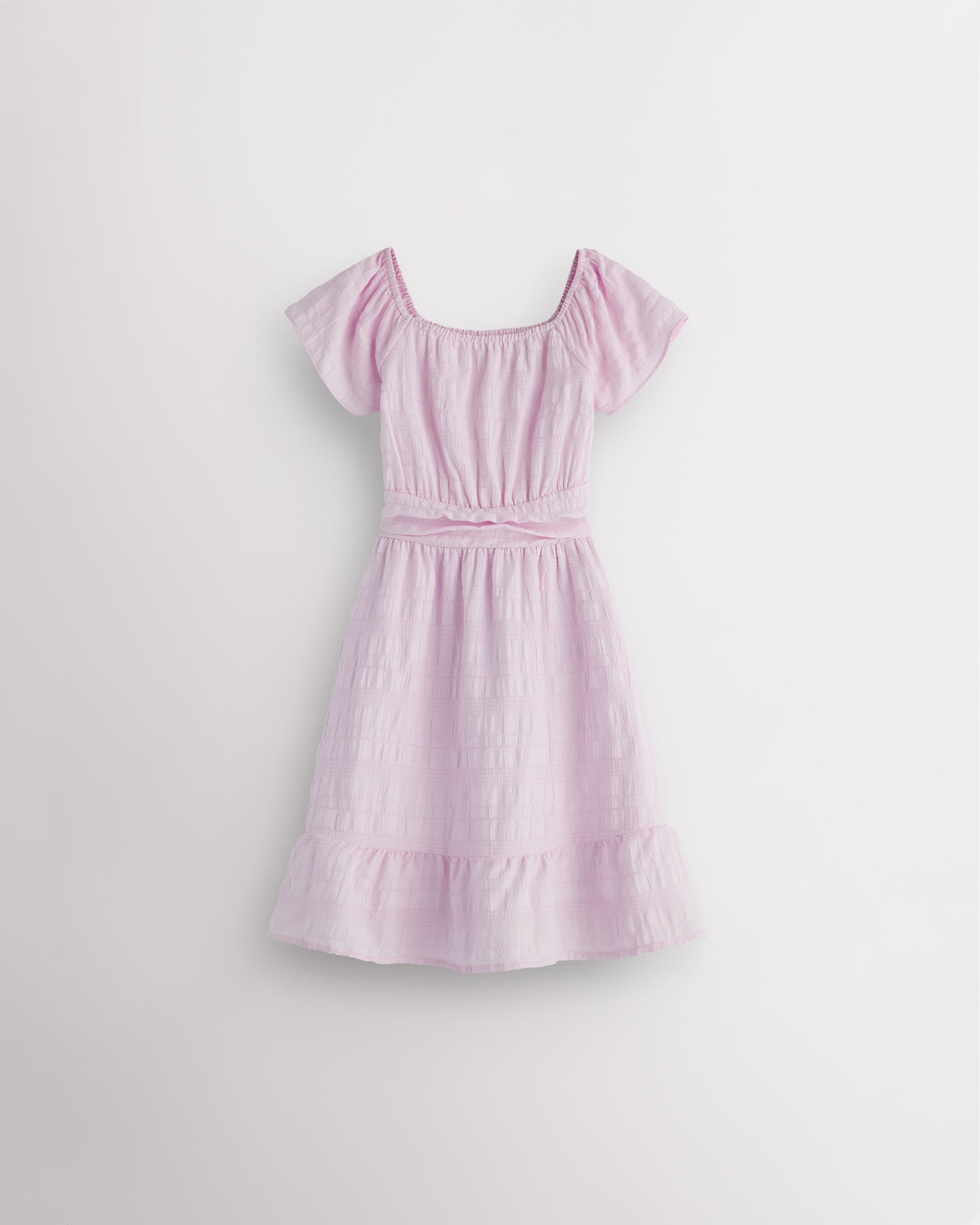 Lilac girls smocked summer dress with short sleeves, square neck, fit-and-flare shape, and ruffle hem.
