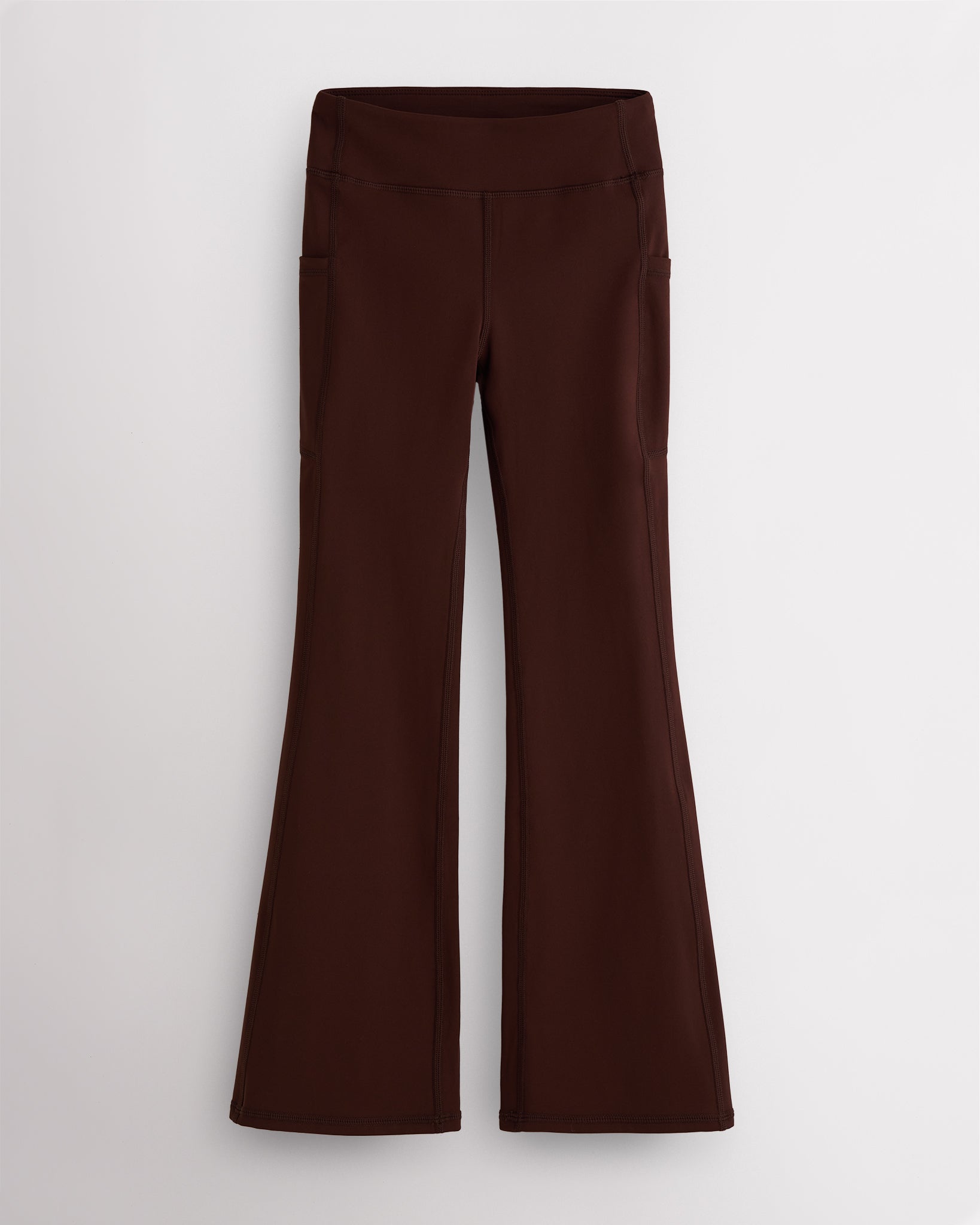 Coffee girls flare leggings with high waist, side pockets, sleek waistband, and flared hem for activewear and everyday movement.